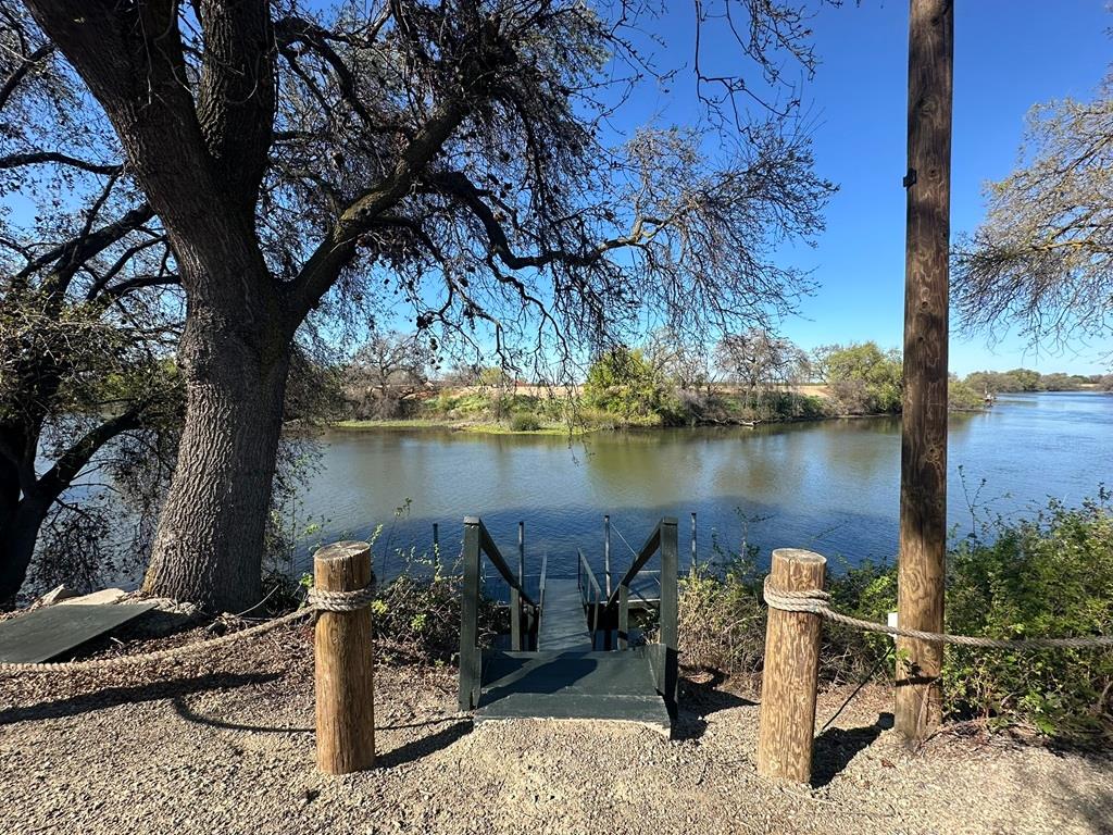 14101 Bethany Road Tracy, CA 95304 - Photo 51 of 68 a lake view with a table and chairs