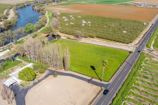 a view of a street with sitting area