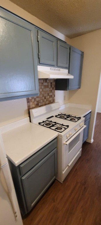 1142 Orchard Park Circle Pflugerville, TX 78660 - Photo 4 of 11 a white stove top oven sitting inside of a kitchen