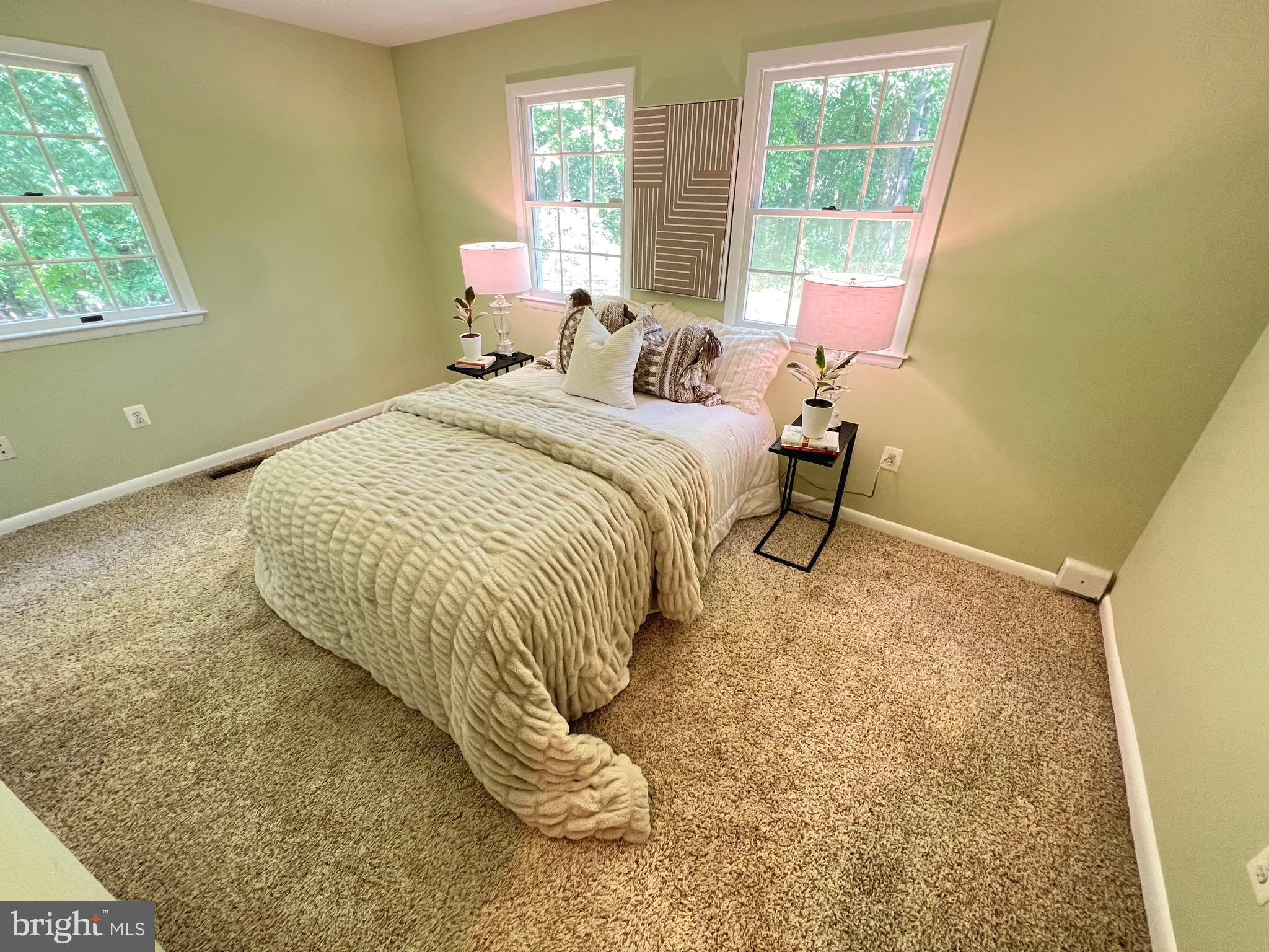 1027 Hart Road Baltimore, MD 21286 - Photo 21 of 94 a bedroom with a bed and a window