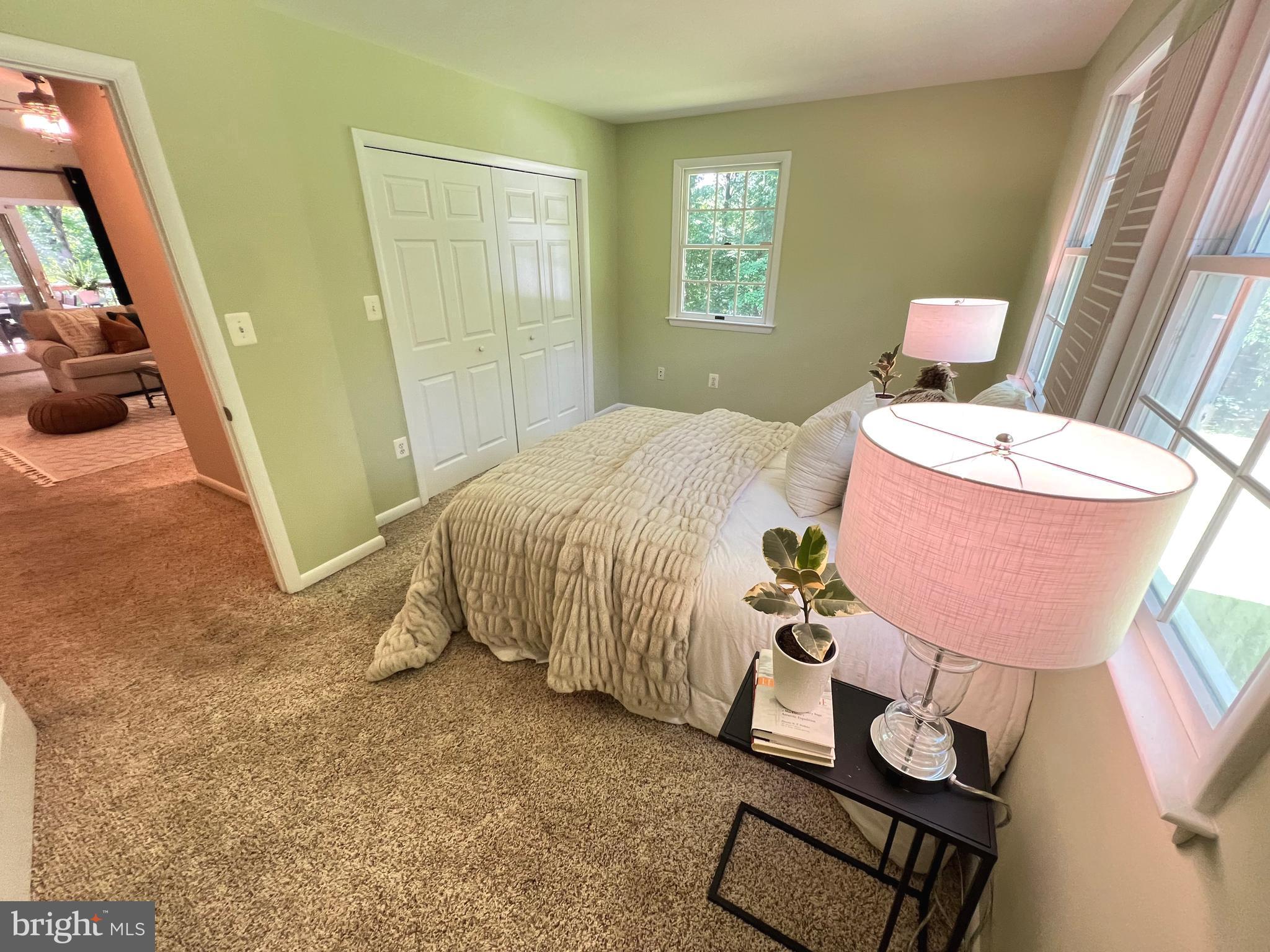 1027 Hart Road Baltimore, MD 21286 - Photo 22 of 94 a bedroom with a bed and wooden floor