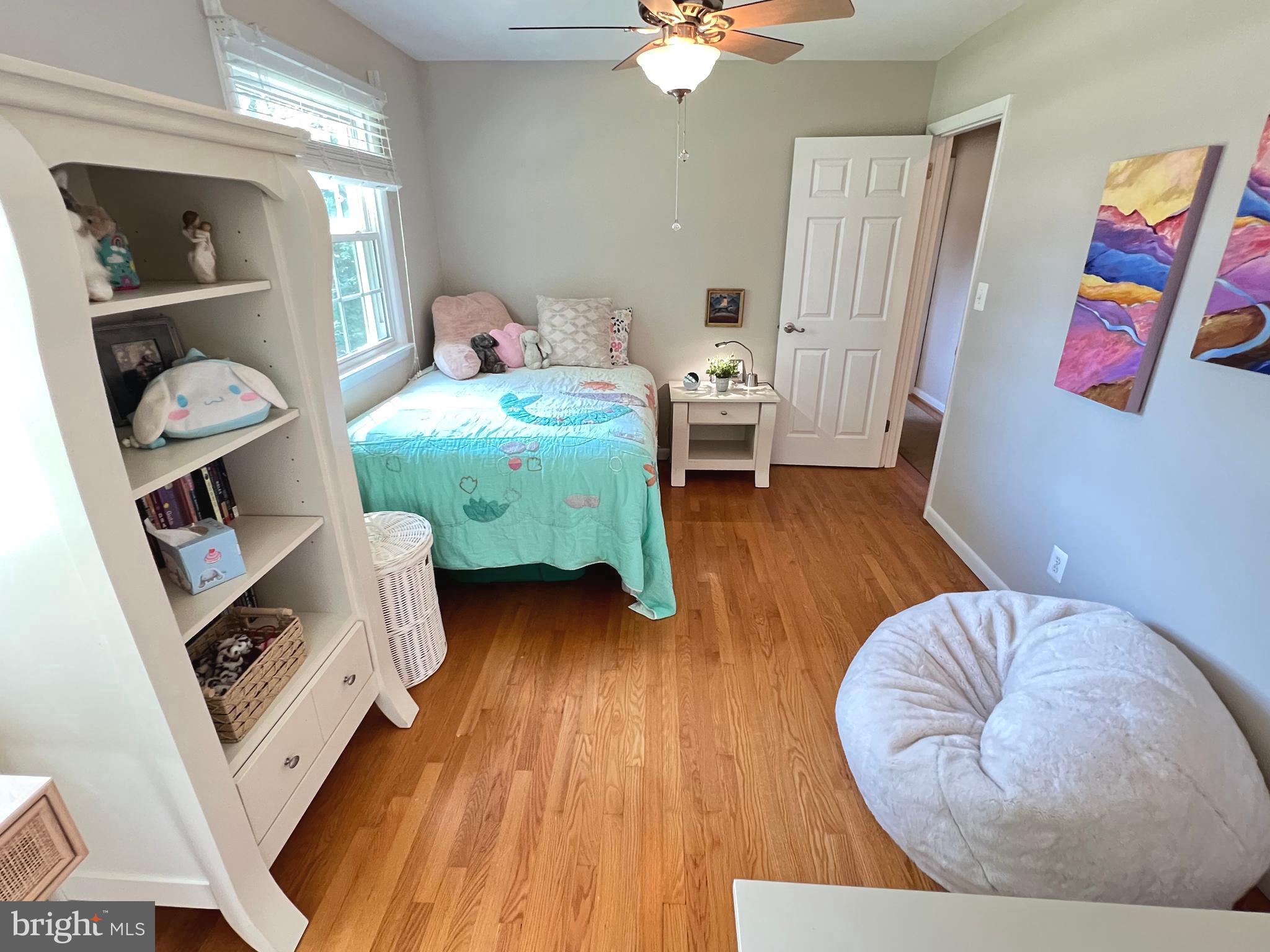 1027 Hart Road Baltimore, MD 21286 - Photo 38 of 94 a living room with furniture and a wooden floor