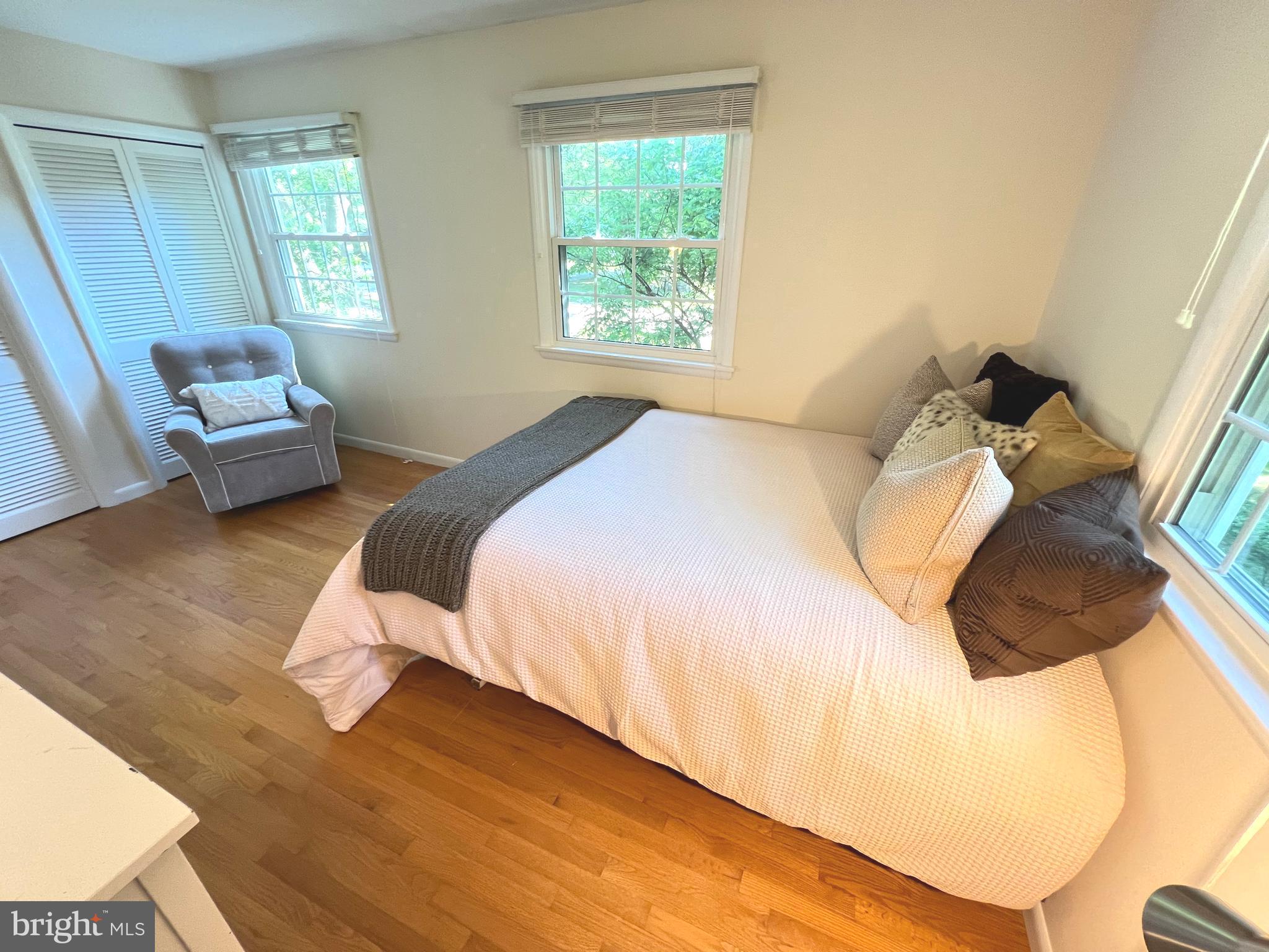 1027 Hart Road Baltimore, MD 21286 - Photo 41 of 94 a bedroom with a bed and a couch