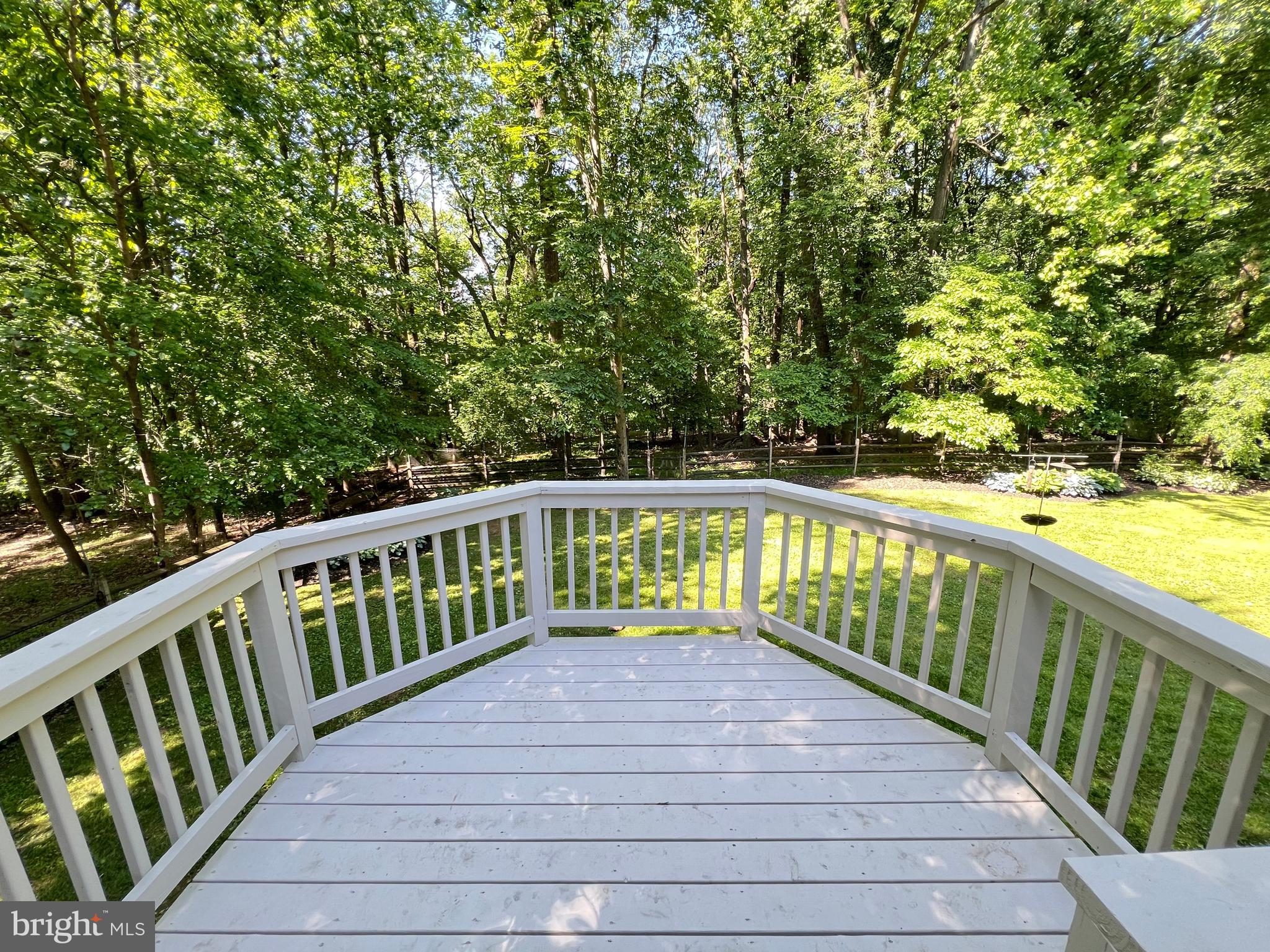 1027 Hart Road Baltimore, MD 21286 - Photo 58 of 94 a balcony with trees in front of it