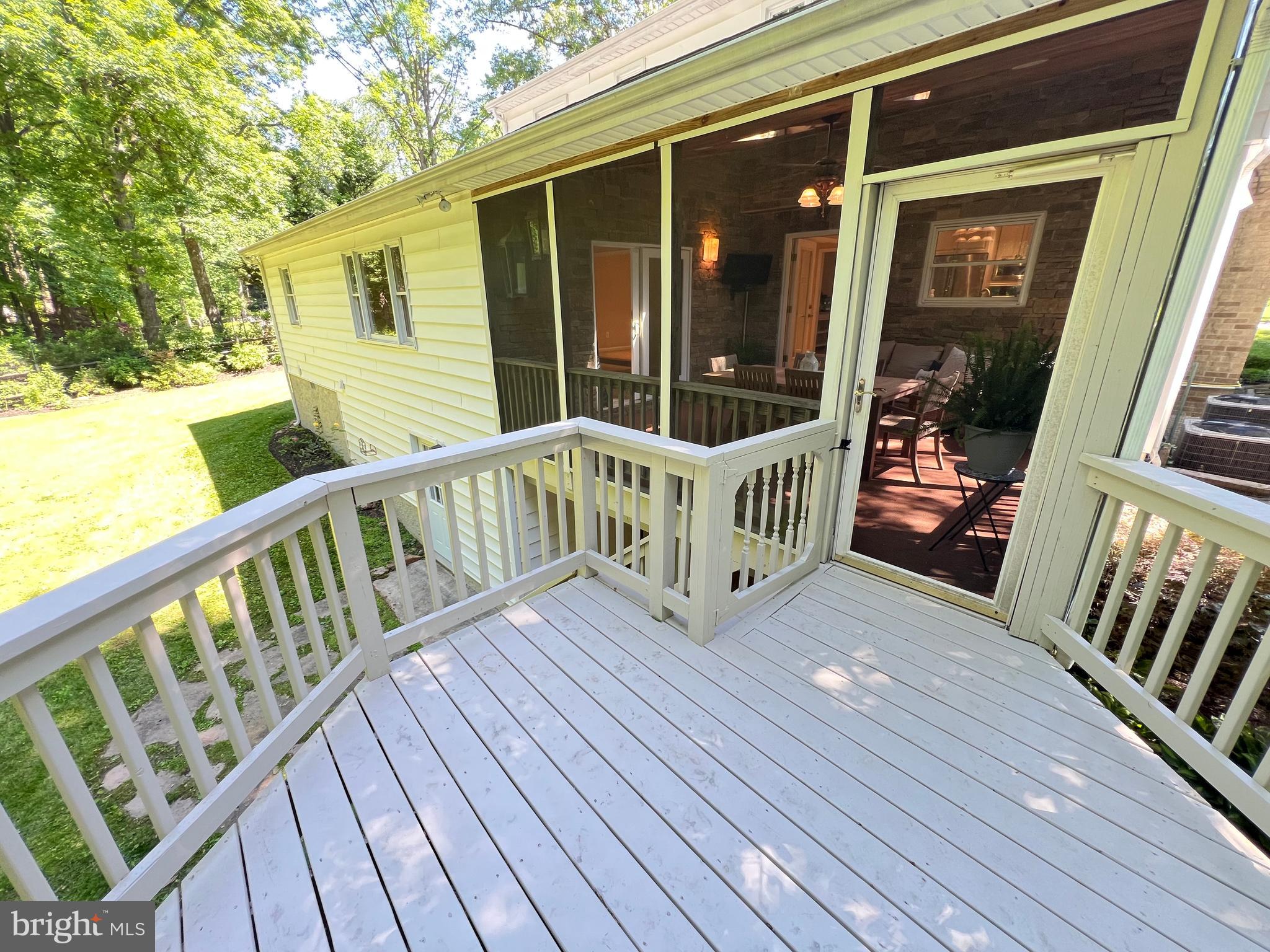 1027 Hart Road Baltimore, MD 21286 - Photo 59 of 94 a view of deck with a table and chairs