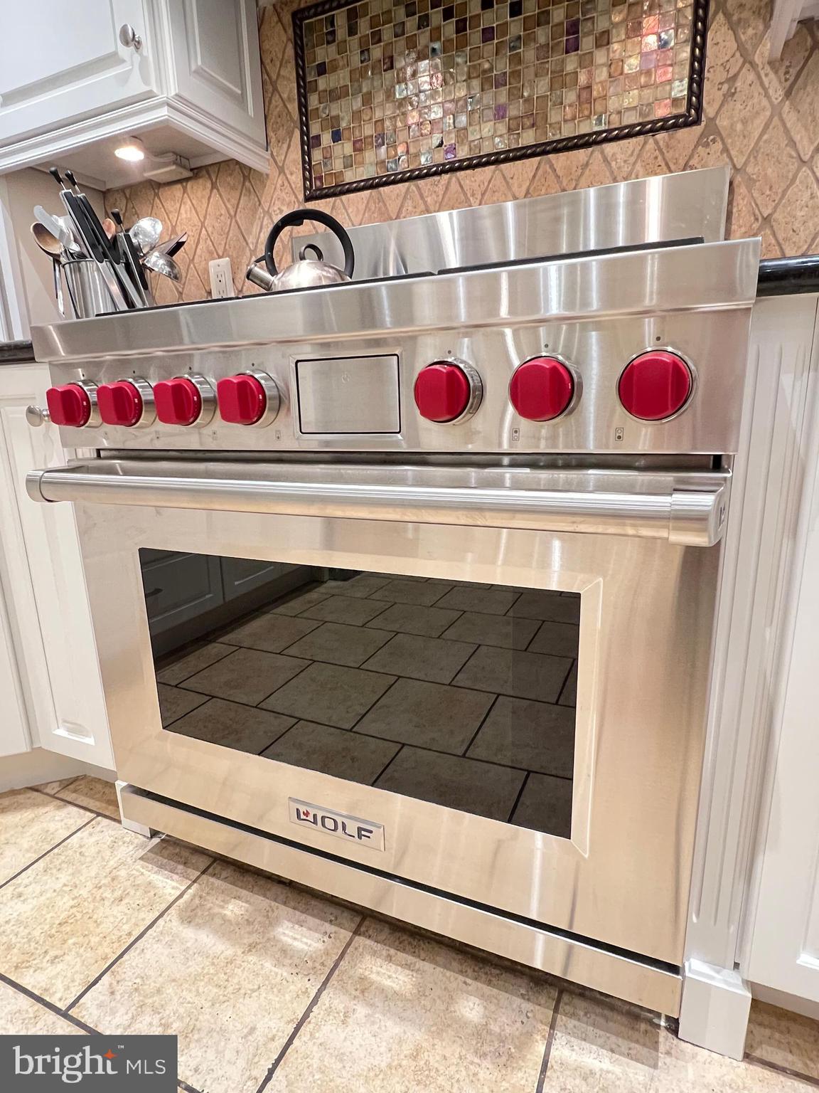 1027 Hart Road Baltimore, MD 21286 - Photo 10 of 94 Wolf dual fuel gas range.