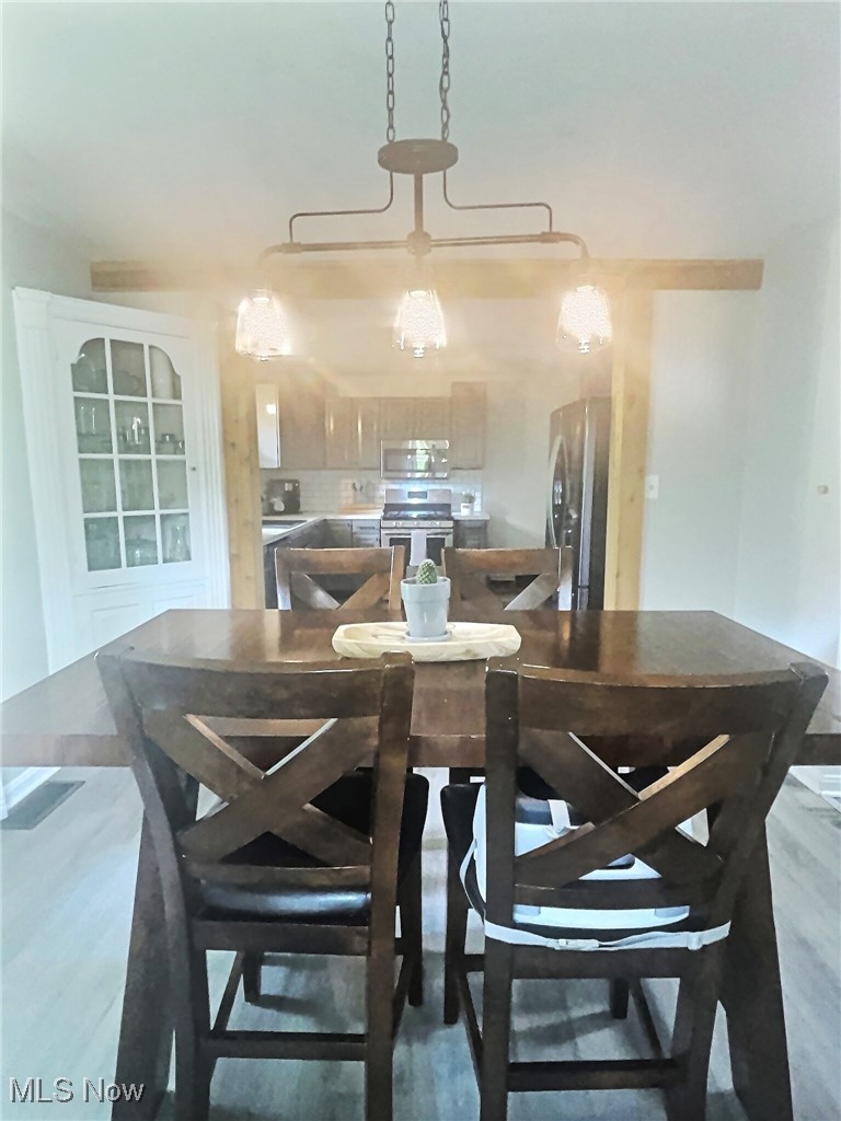 3688 Easton Road Norton, OH 44203 - Photo 14 of 37 Dining space with dark hardwood / wood-style flooring