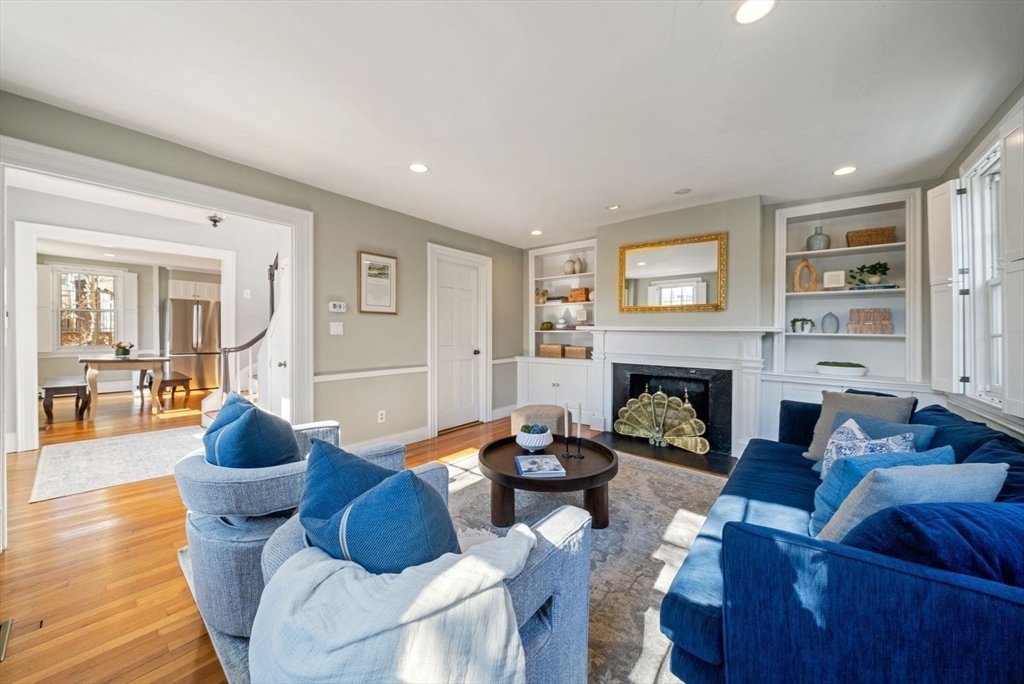 10 Summer Street, Unit 1 Boston, MA 02129 - Photo 1 of 37 a living room with furniture and a fireplace