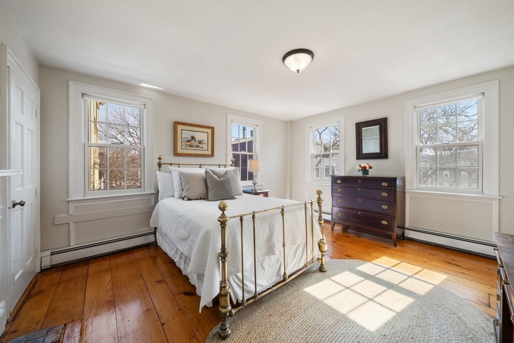 10 Summer Street, Unit 1 Boston, MA 02129 - Photo 17 of 37 a bed room with a bed and a tv