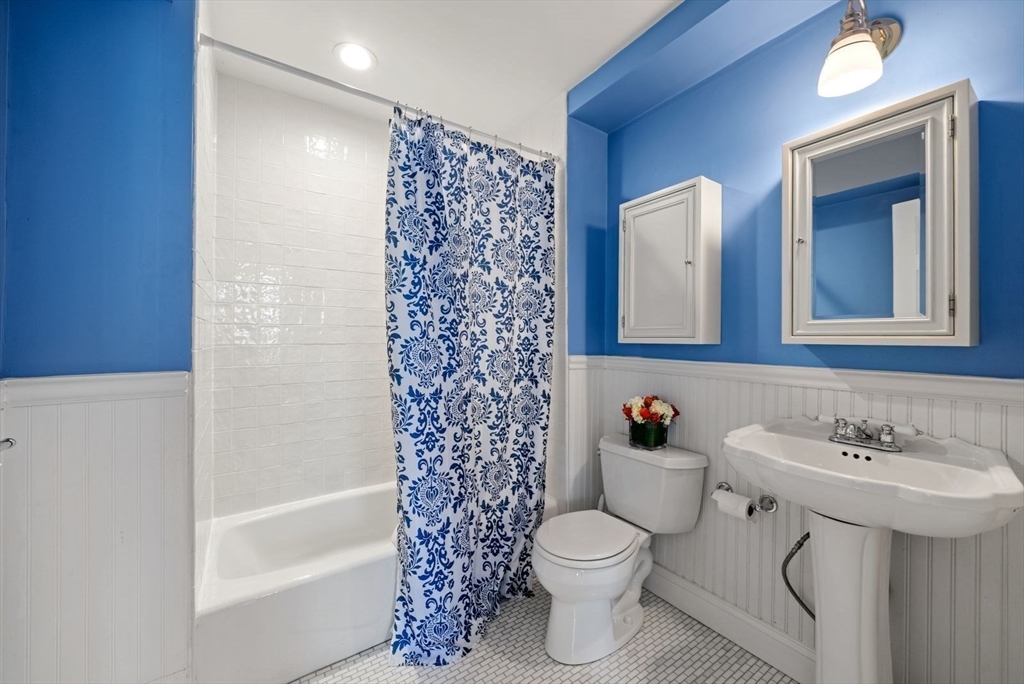 10 Summer Street, Unit 1 Boston, MA 02129 - Photo 19 of 37 a bathroom with a sink toilet and shower