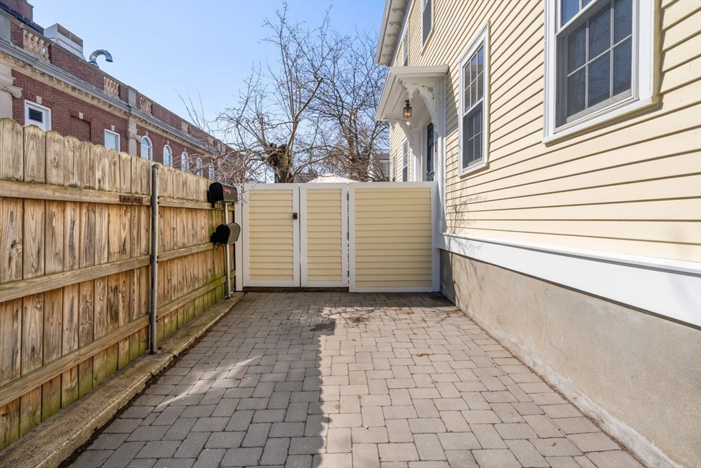 10 Summer Street, Unit 1 Boston, MA 02129 - Photo 33 of 37 a view of a back yard of the house