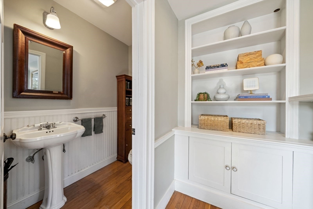 10 Summer Street, Unit 1 Boston, MA 02129 - Photo 4 of 37 a bathroom with a sink and a mirror