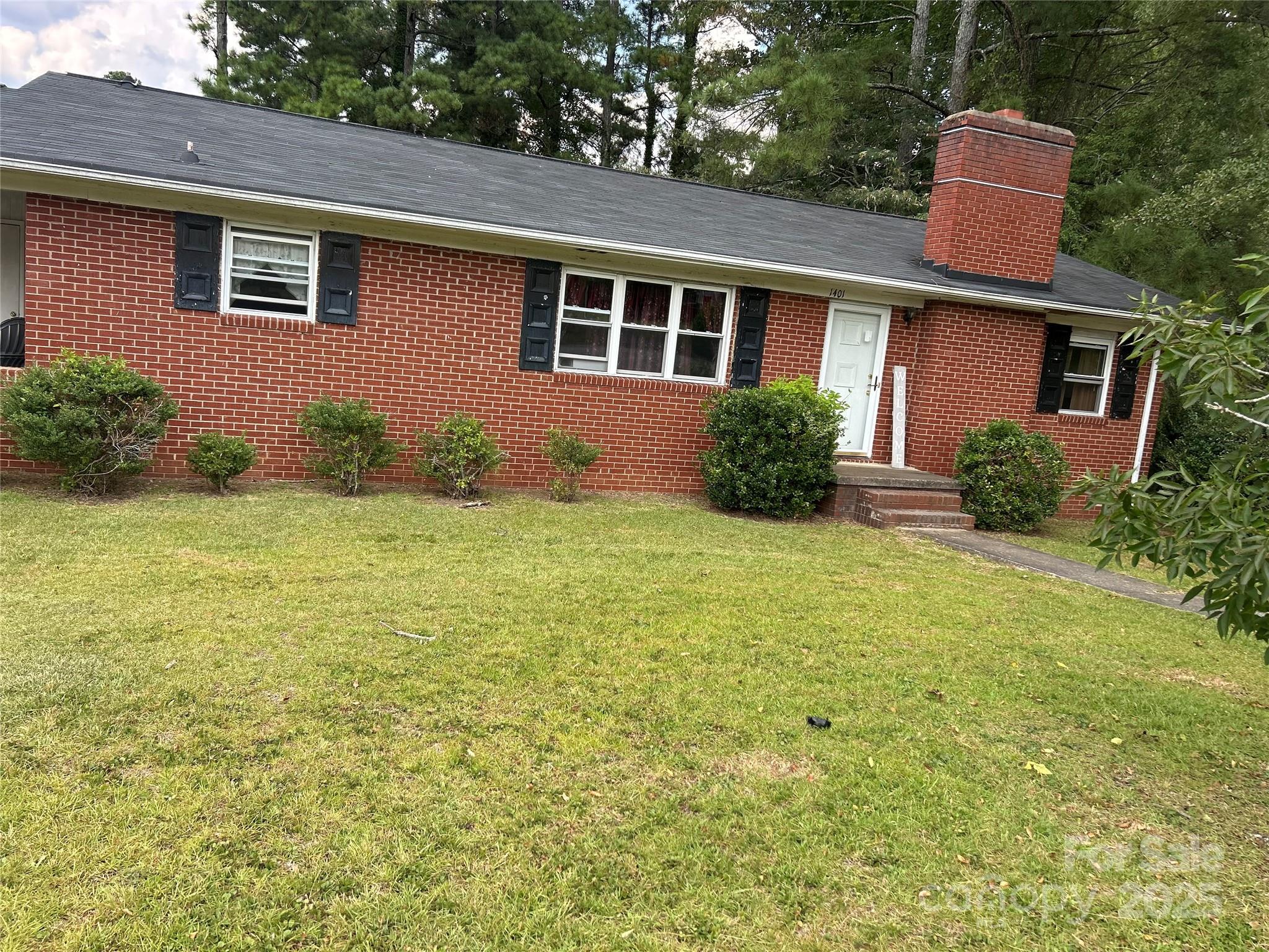1401 Morven Road Wadesboro, NC 28170 - Photo 2 of 27 a front view of house with yard and green space