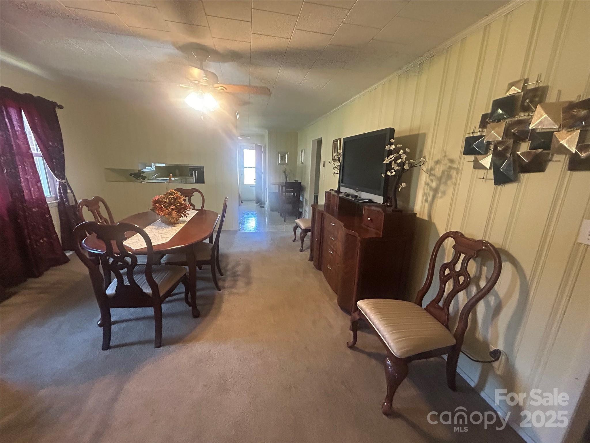 1401 Morven Road Wadesboro, NC 28170 - Photo 10 of 27 a view of a livingroom with furniture and a couch