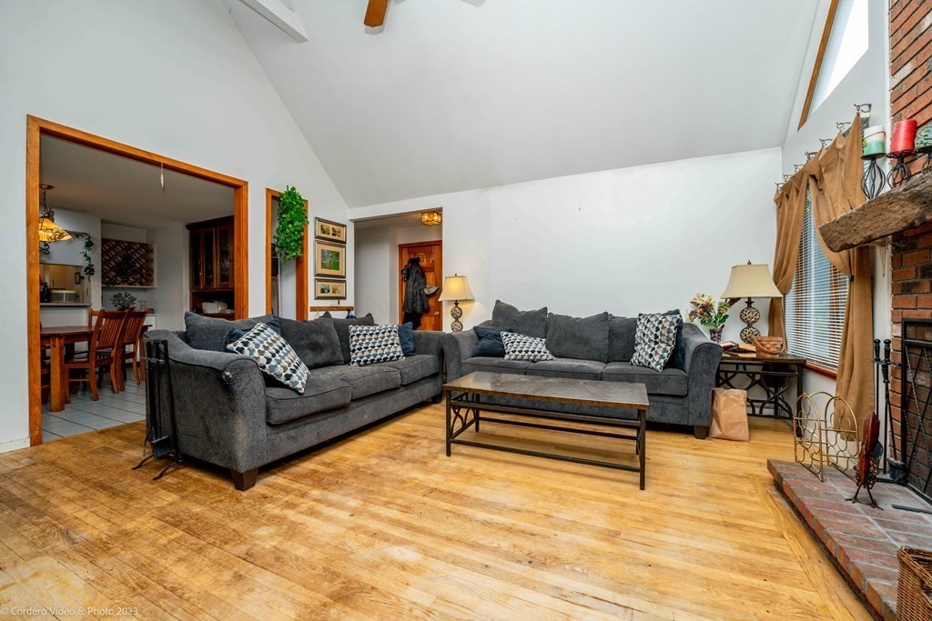 30 Wordell Street Rochester, MA 02770 - Photo 14 of 31 a living room with furniture and a wooden floor