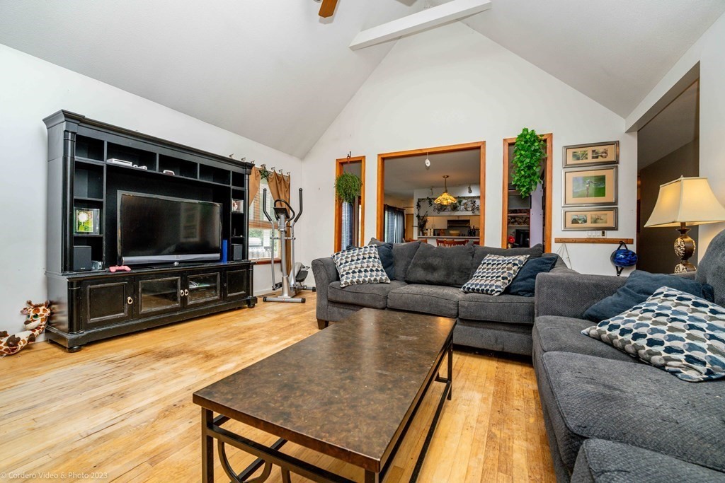 30 Wordell Street Rochester, MA 02770 - Photo 15 of 31 a living room with furniture and a flat screen tv