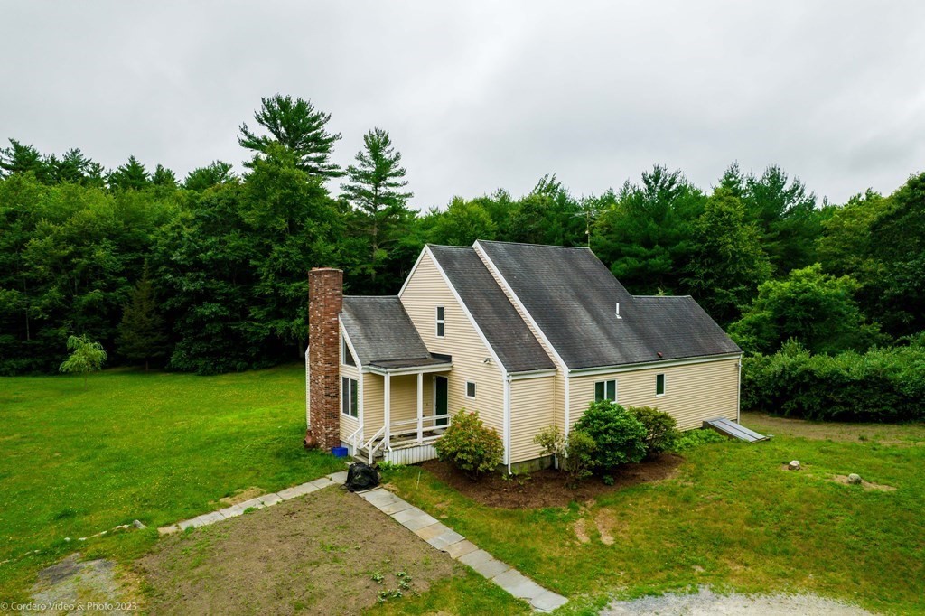 30 Wordell Street Rochester, MA 02770 - Photo 2 of 31 a aerial view of a house with garden