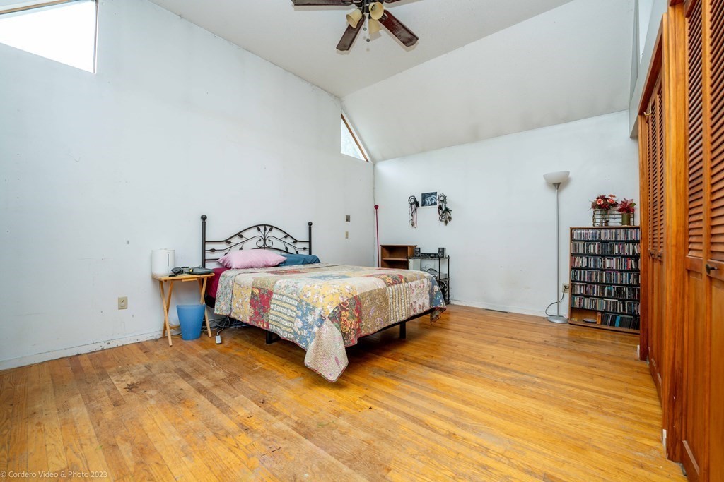30 Wordell Street Rochester, MA 02770 - Photo 23 of 31 a bedroom with a bed and a table