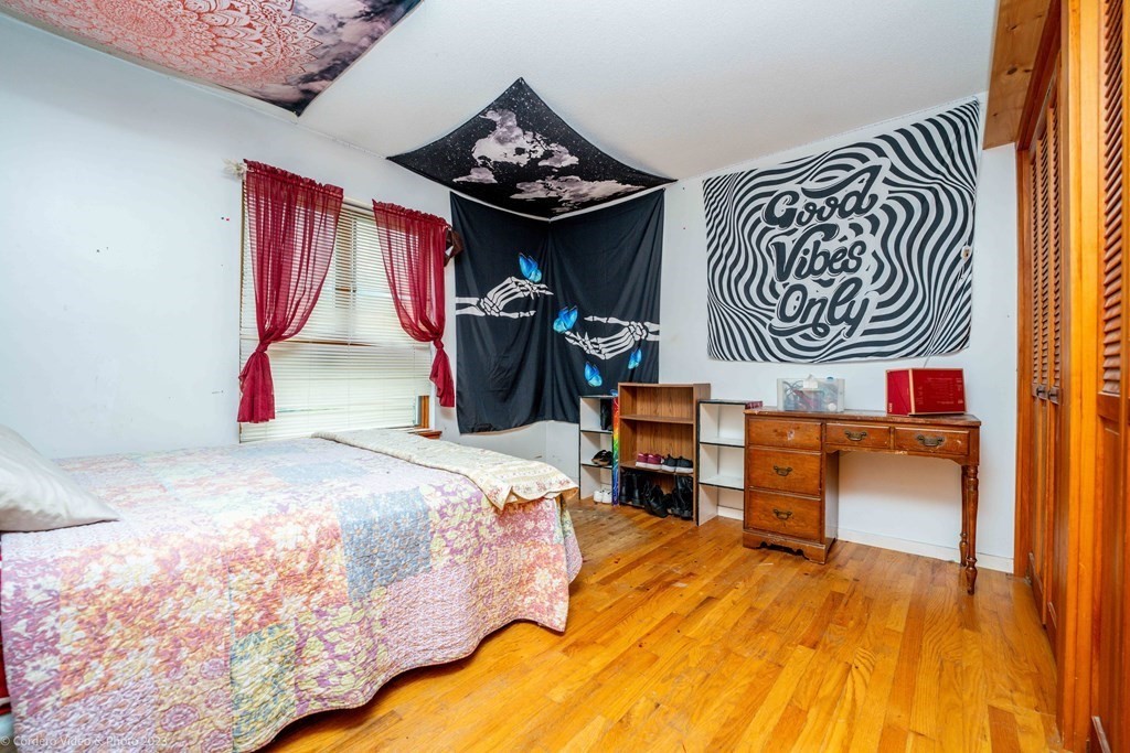 30 Wordell Street Rochester, MA 02770 - Photo 26 of 31 a bedroom with a bed and a desk