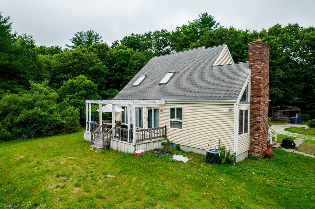30 Wordell Street Rochester, MA 02770 - Photo 3 of 31 a aerial view of a house with a yard patio and slide
