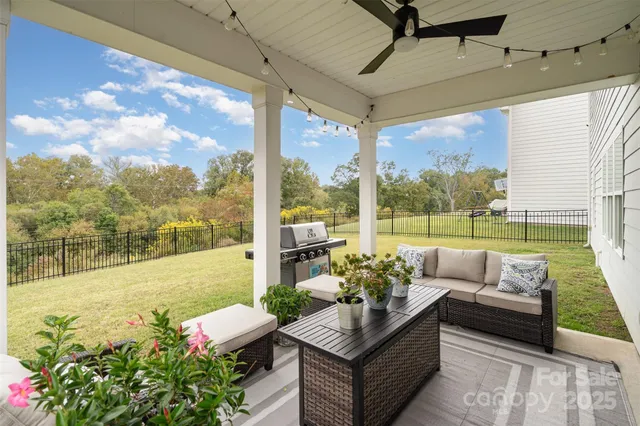 a outdoor living space with furniture and garden view