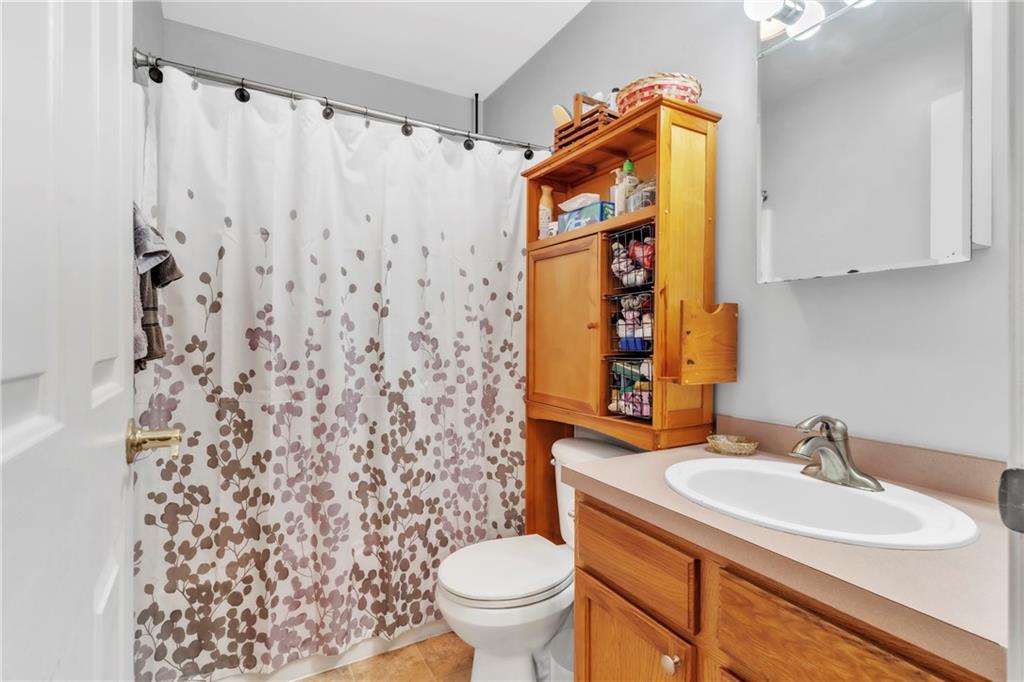 120 West Catherine Street Somerset, PA 15501 - Photo 17 of 31 a bathroom with a sink toilet and a mirror