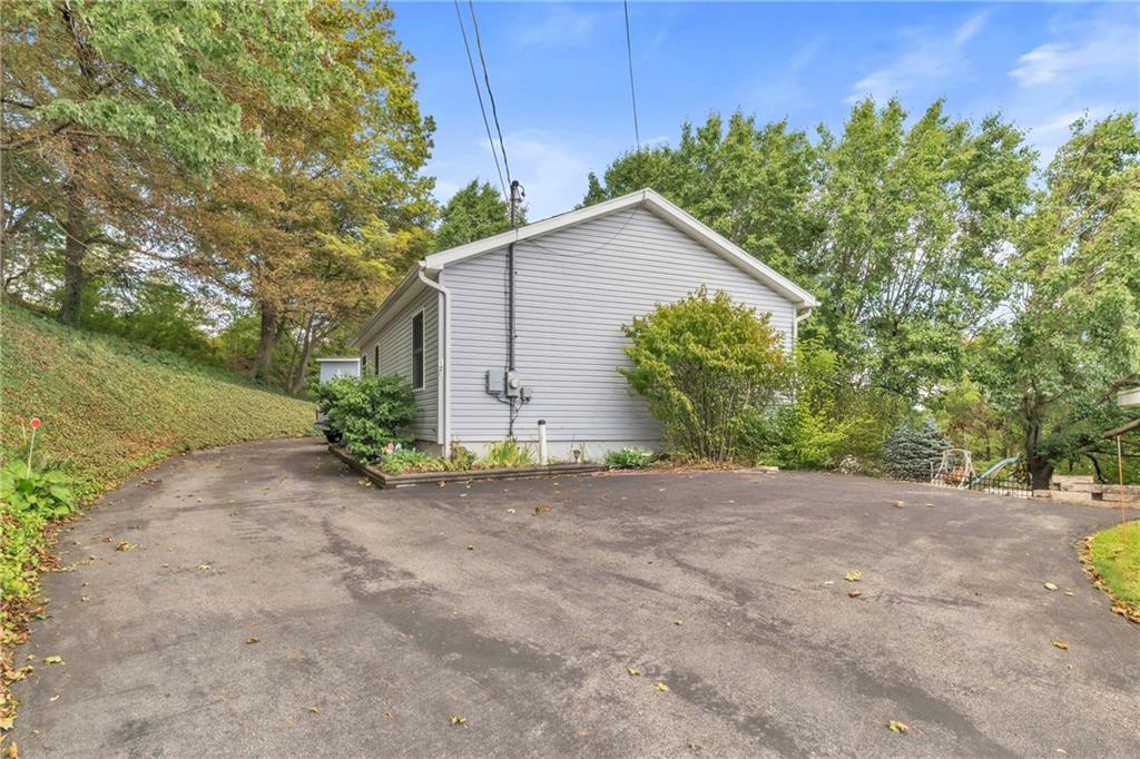 120 West Catherine Street Somerset, PA 15501 - Photo 26 of 31 a view of a house with a yard and potted plants