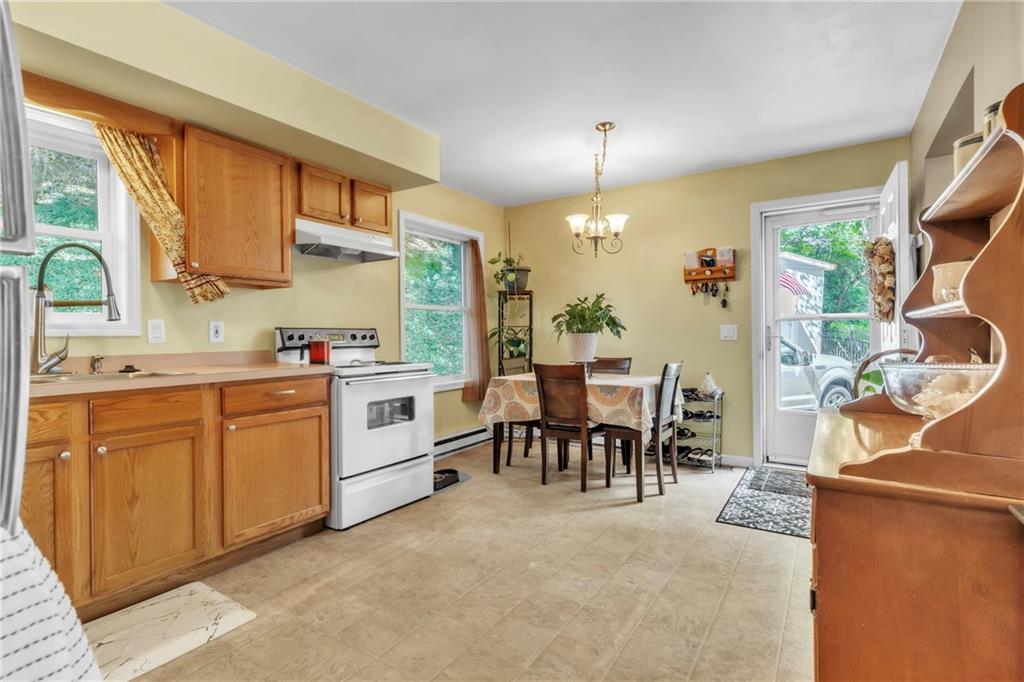 120 West Catherine Street Somerset, PA 15501 - Photo 4 of 31 a kitchen with white cabinets and sink