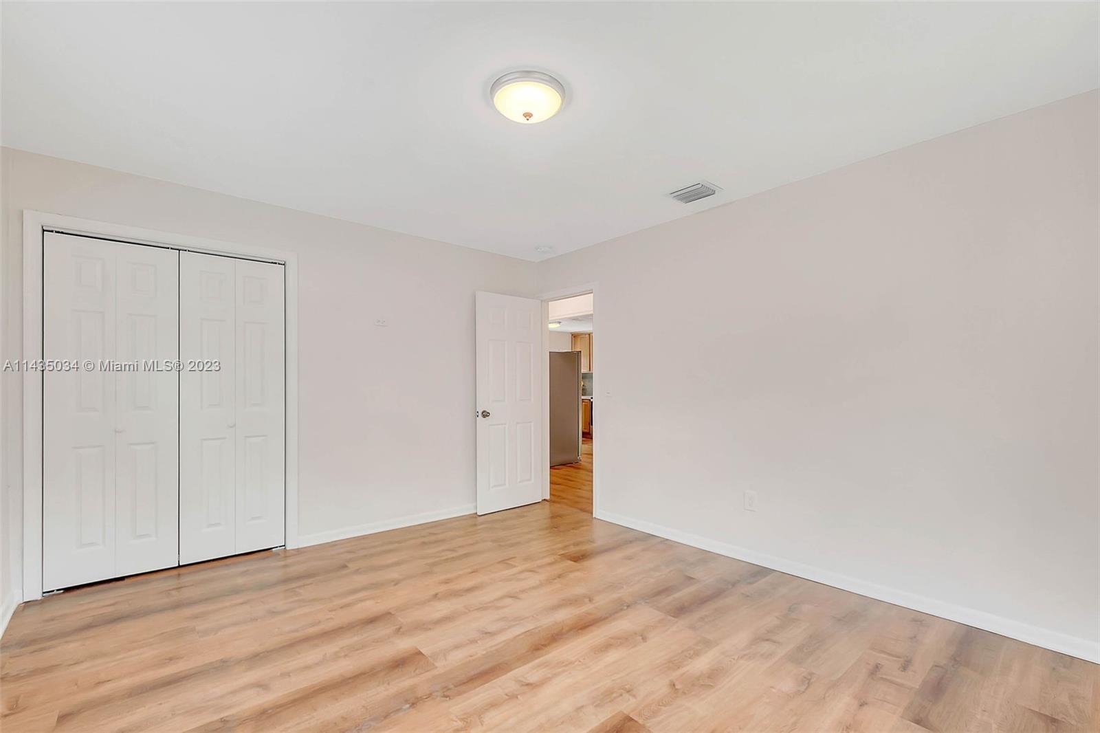 1023 Northwest 3rd Avenue Homestead, FL 33030 - Photo 13 of 32 a view of an empty room