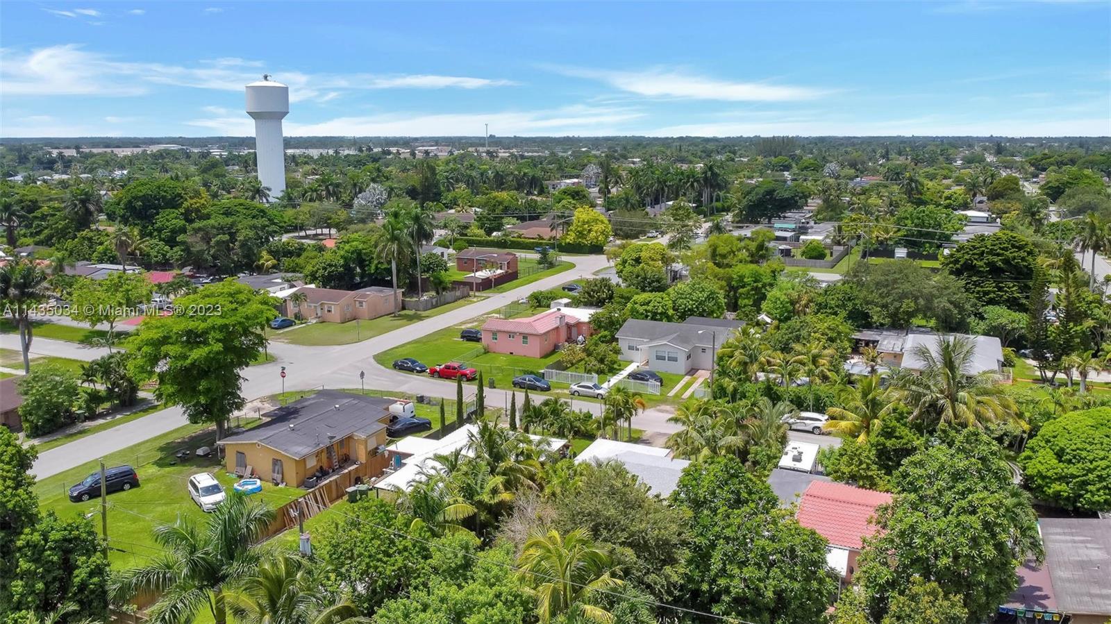 1023 Northwest 3rd Avenue Homestead, FL 33030 - Photo 28 of 32 an aerial view of residential houses with outdoor space and trees