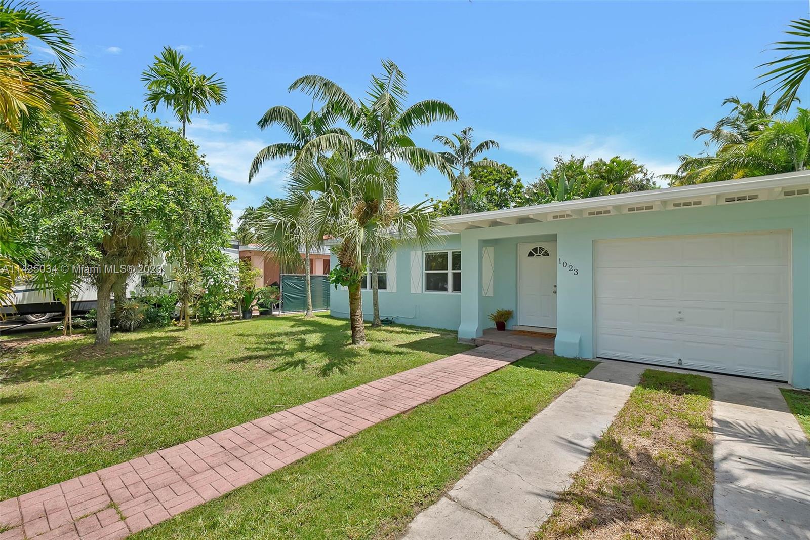 1023 Northwest 3rd Avenue Homestead, FL 33030 - Photo 6 of 32 a view of a house with a garden