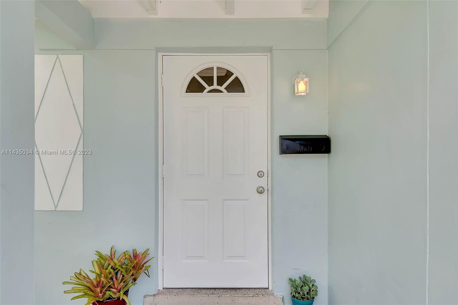 1023 Northwest 3rd Avenue Homestead, FL 33030 - Photo 7 of 32 a view of front door and wooden floor