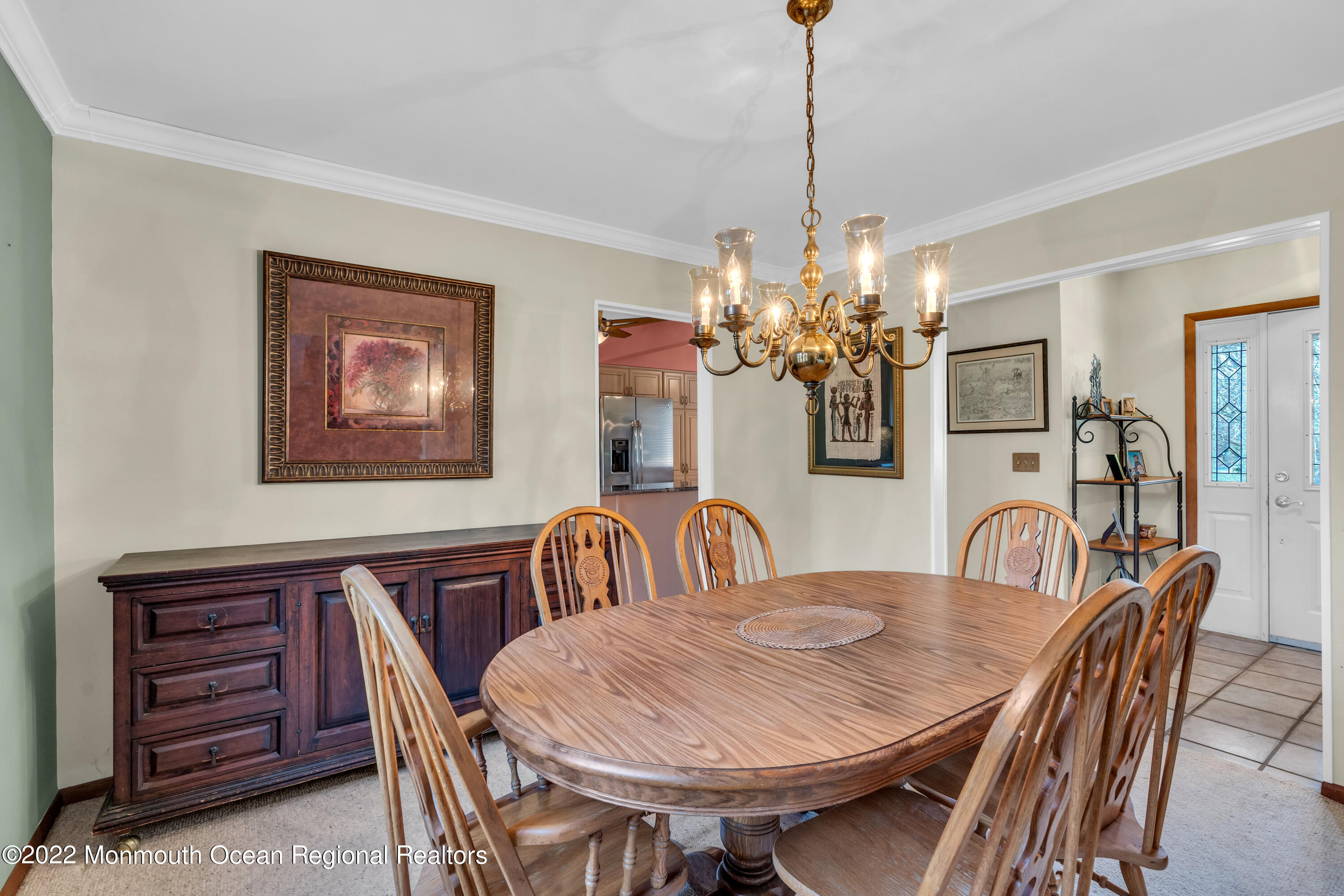 39 Johnson Lane Jackson, NJ 08527 - Photo 12 of 47 a dining room with furniture and chandelier
