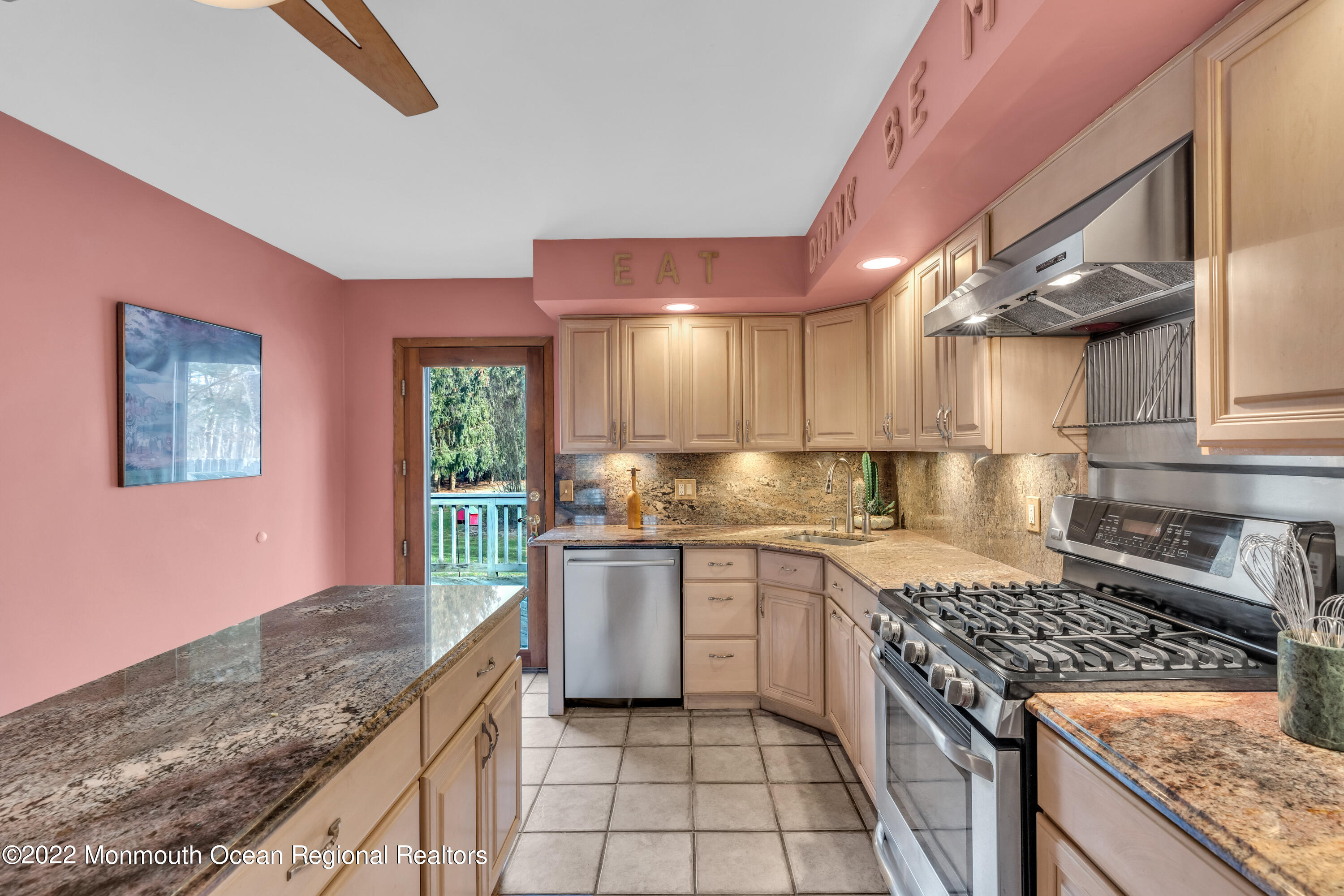 39 Johnson Lane Jackson, NJ 08527 - Photo 16 of 47 a kitchen with stainless steel appliances granite countertop a stove a sink and a microwave