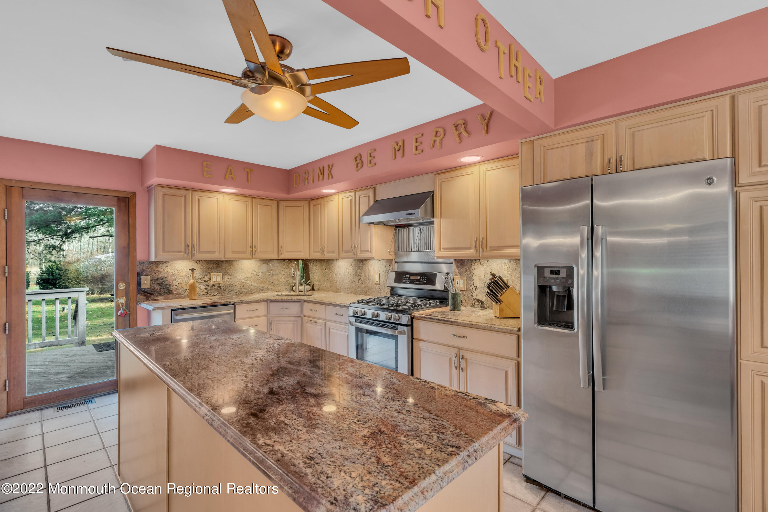 39 Johnson Lane Jackson, NJ 08527 - Photo 17 of 47 a kitchen with stainless steel appliances granite countertop a sink a stove and a refrigerator