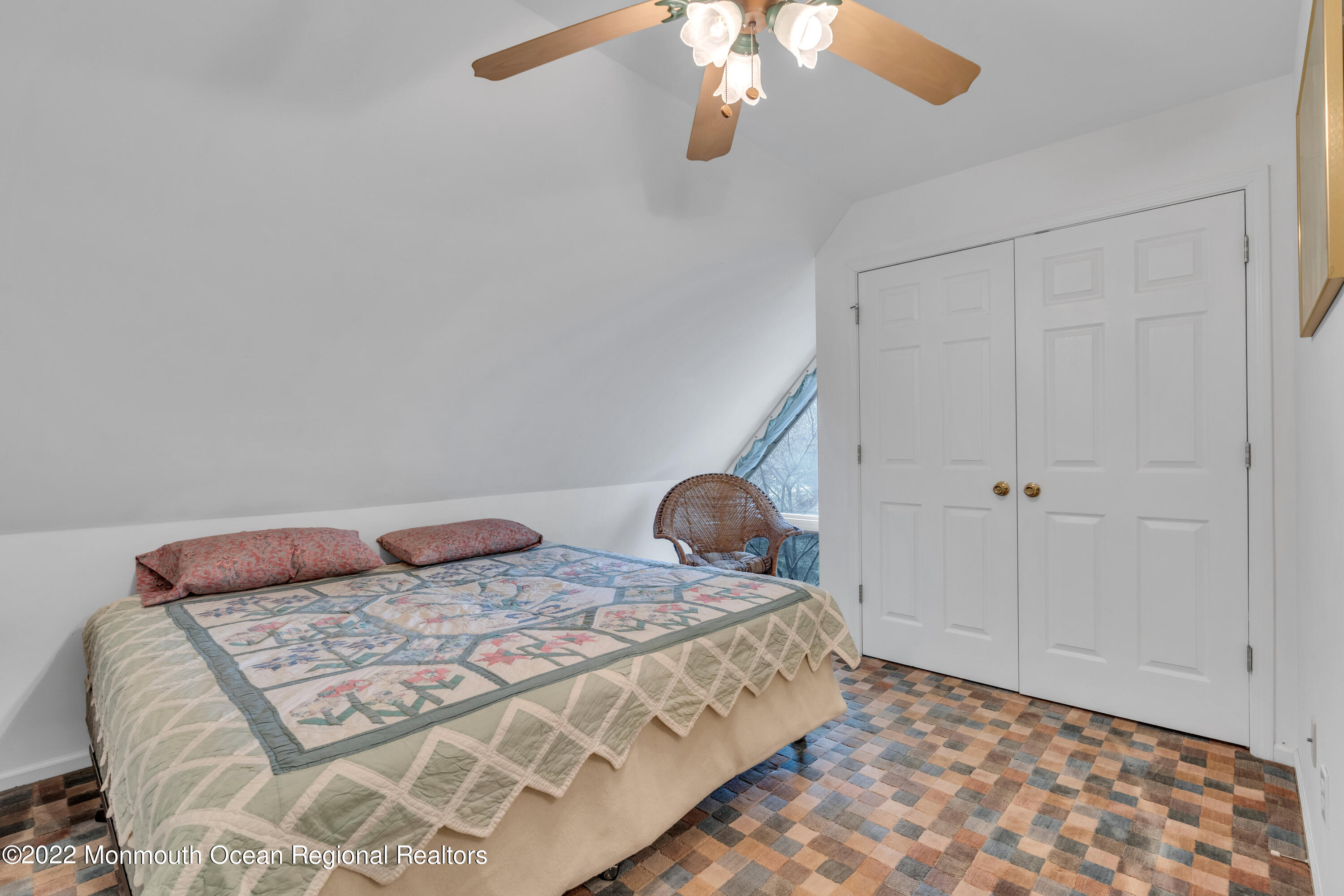 39 Johnson Lane Jackson, NJ 08527 - Photo 26 of 47 a bedroom with a bed and a chandelier