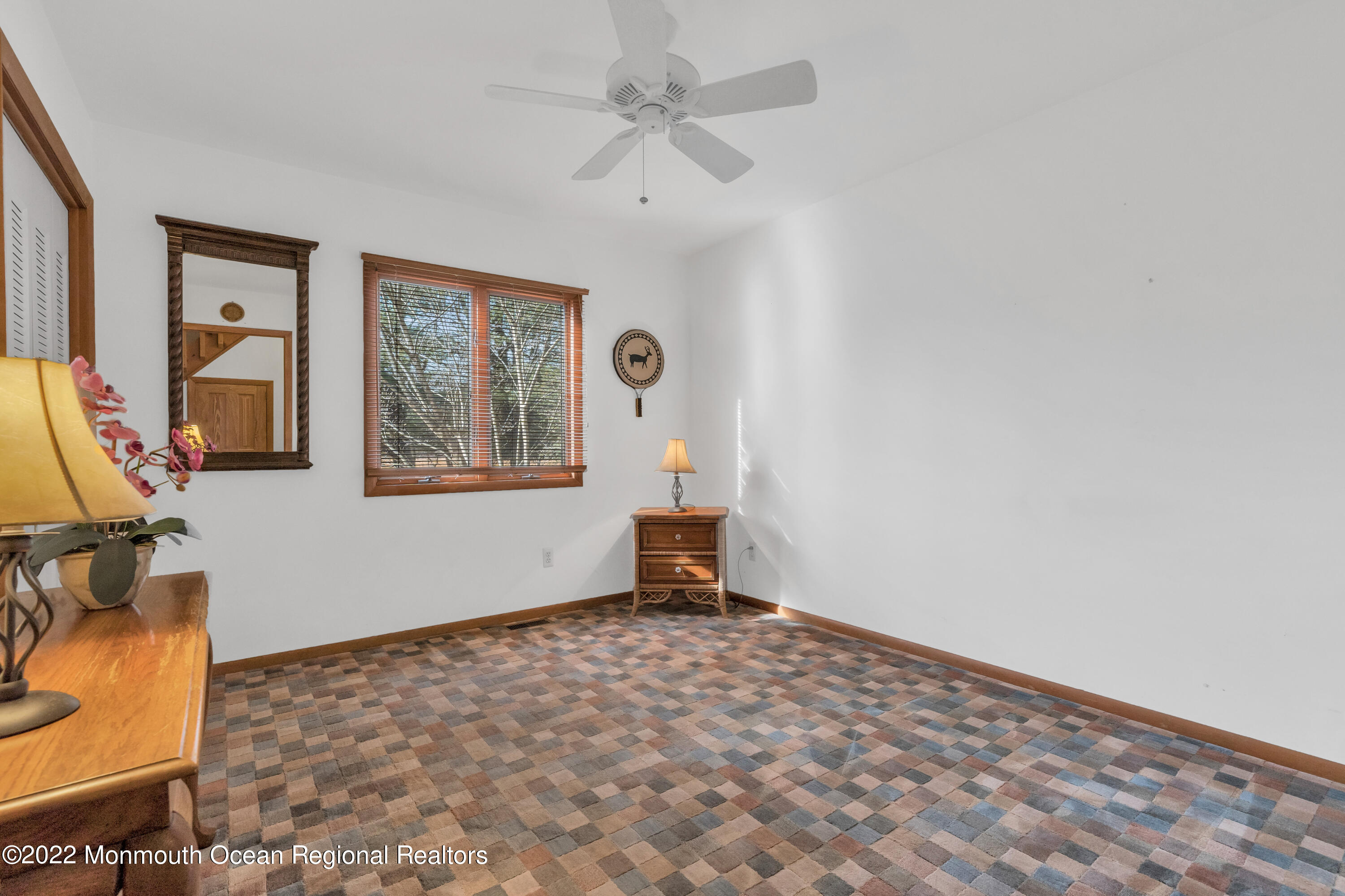 39 Johnson Lane Jackson, NJ 08527 - Photo 28 of 47 a room that has a window and a table