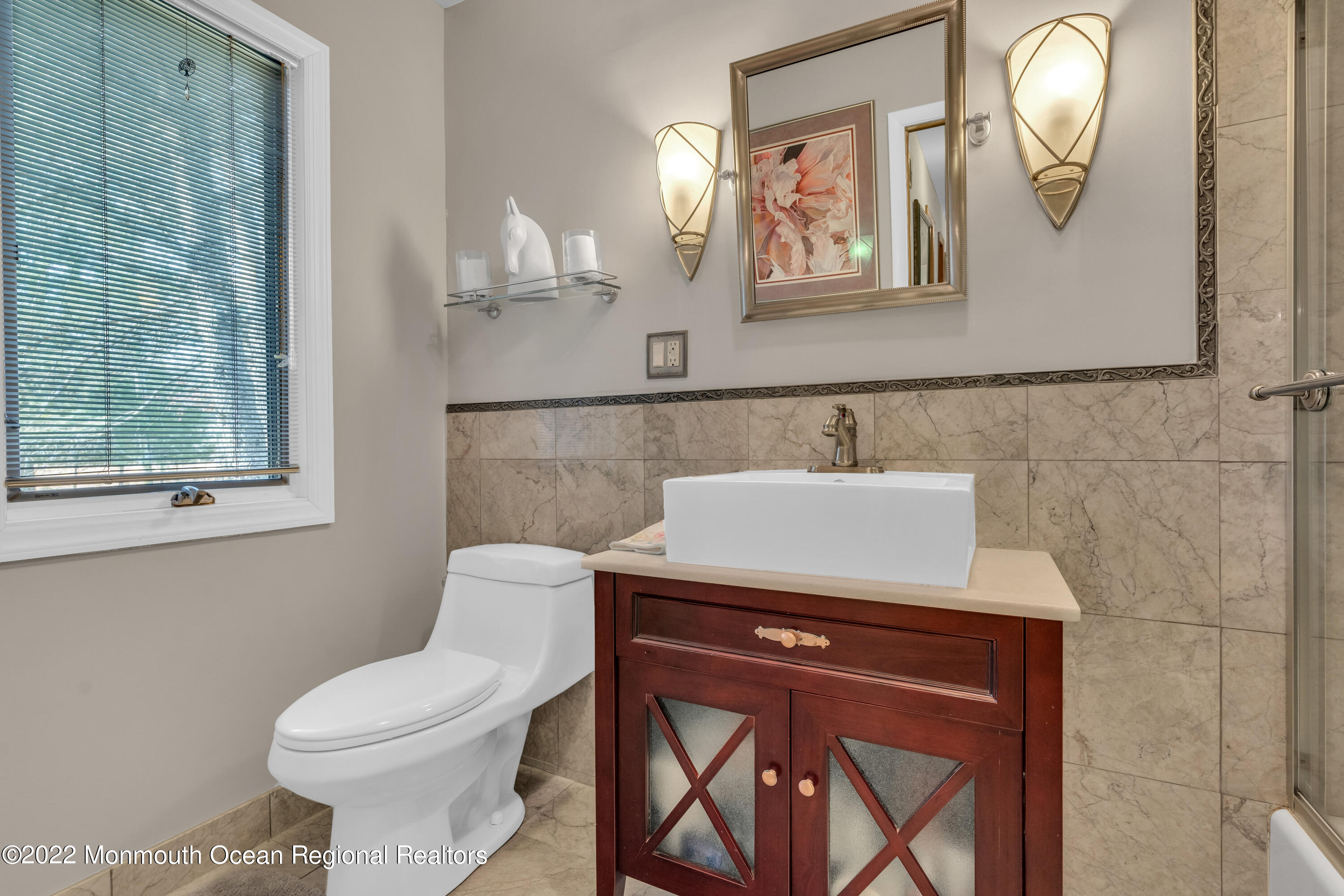 39 Johnson Lane Jackson, NJ 08527 - Photo 30 of 47 a bathroom with a toilet a sink and mirror