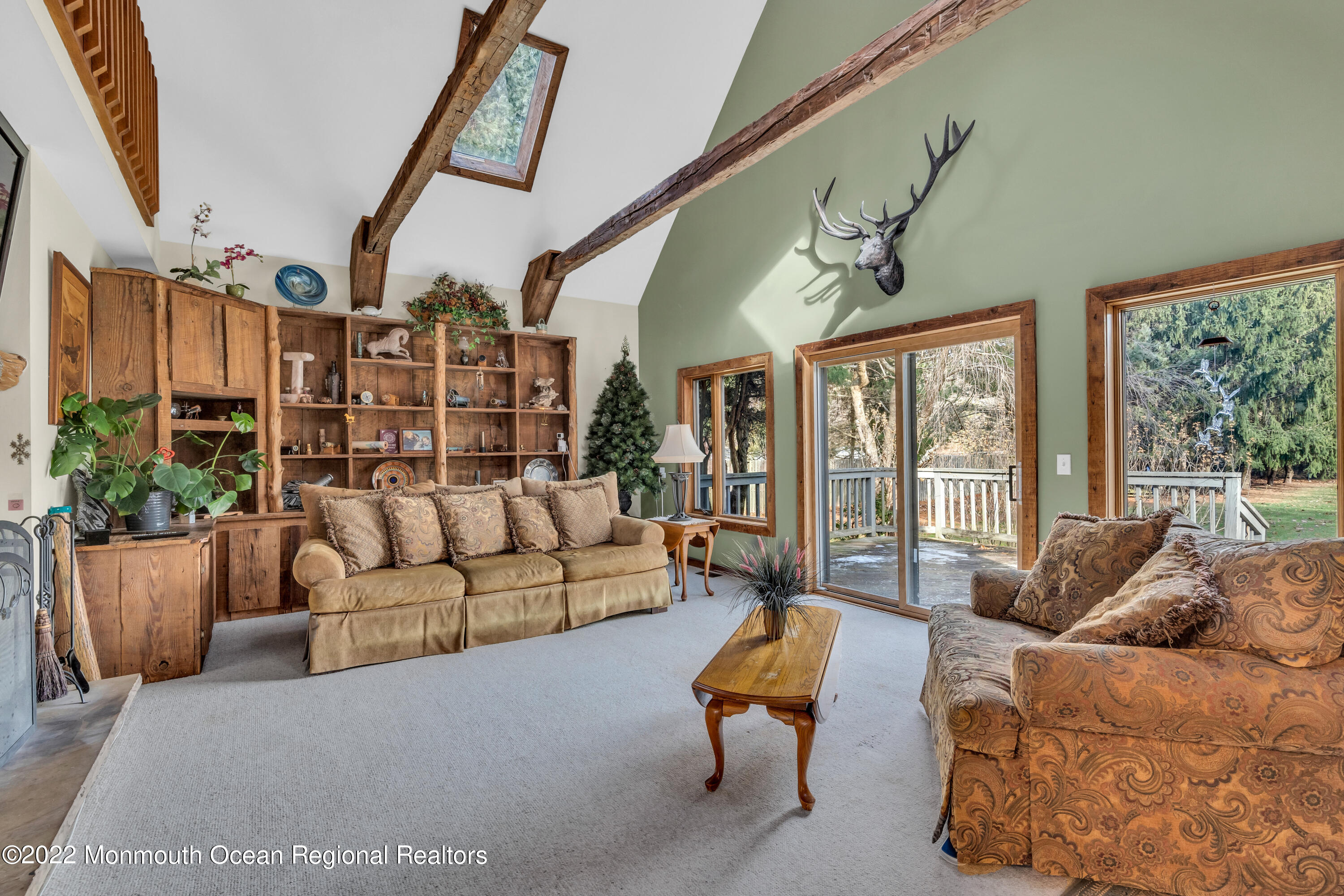 39 Johnson Lane Jackson, NJ 08527 - Photo 8 of 47 a living room with furniture and a large window