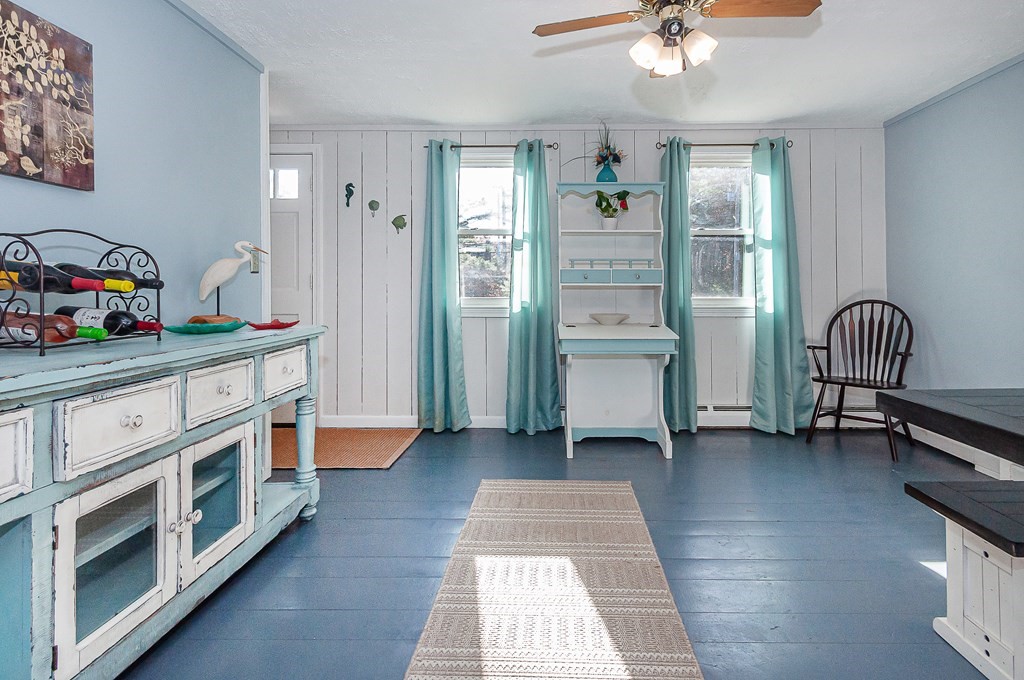 133 High Street Rochester, MA 02770 - Photo 13 of 38 a view of a bedroom with baby crib and a window
