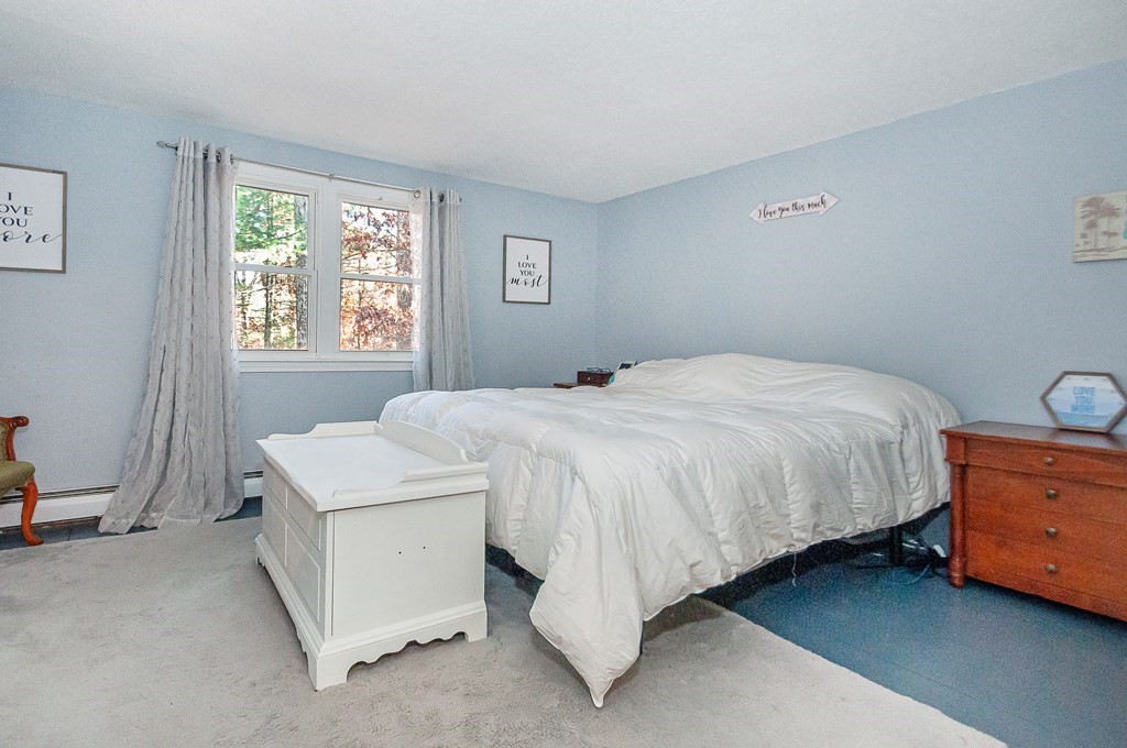 133 High Street Rochester, MA 02770 - Photo 20 of 38 a bedroom with a bed and a window