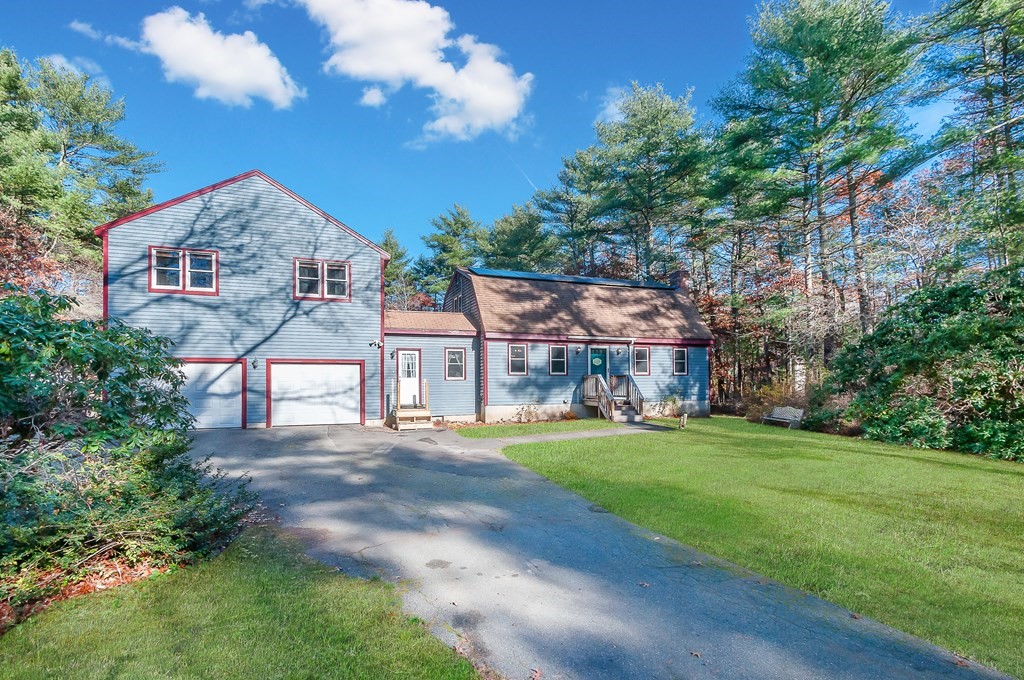 133 High Street Rochester, MA 02770 - Photo 2 of 38 a view of a big house with a big yard and large trees