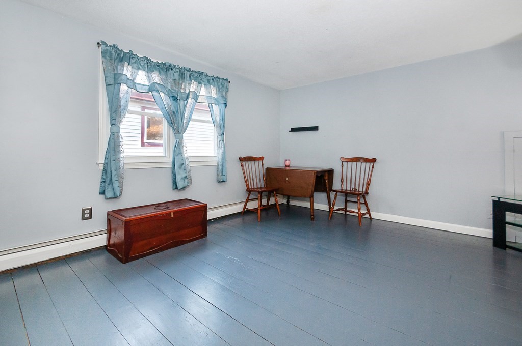 133 High Street Rochester, MA 02770 - Photo 21 of 38 a living room with furniture and a window