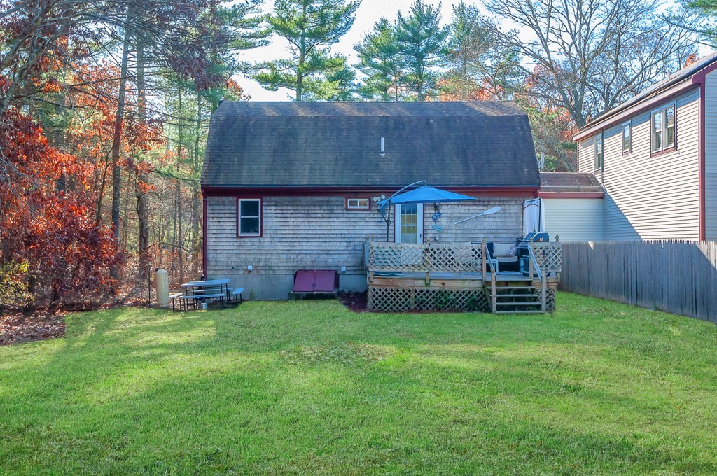 133 High Street Rochester, MA 02770 - Photo 28 of 38 a view of a house with a yard and sitting area