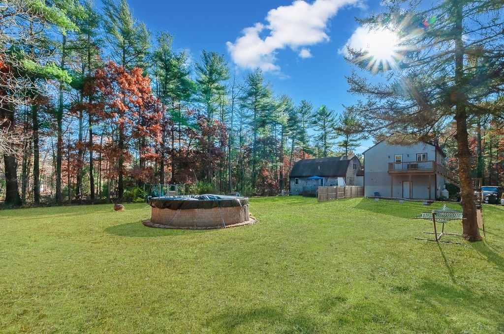 133 High Street Rochester, MA 02770 - Photo 5 of 38 a view of a backyard with garden