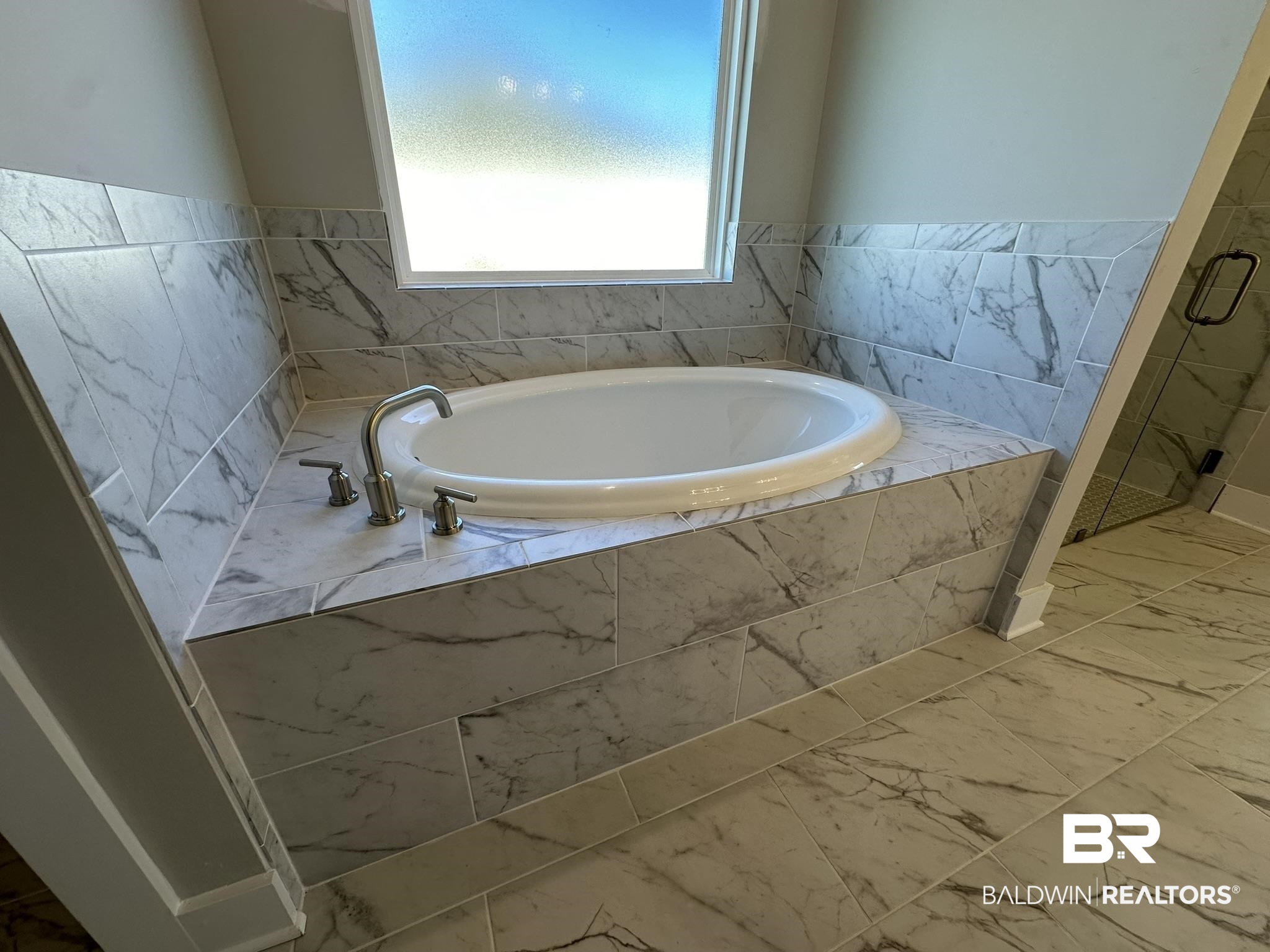23582 Travis Stock Street, Unit 48 Foley, AL 36535 - Photo 40 of 51 Bathroom with independent shower and bath