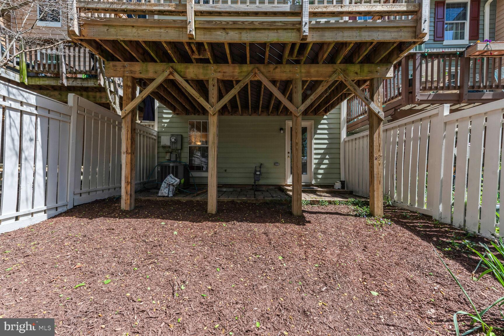 1553 Autumn Ridge Circle Reston, VA 20194 - Photo 23 of 33 View from rear fence into back yard