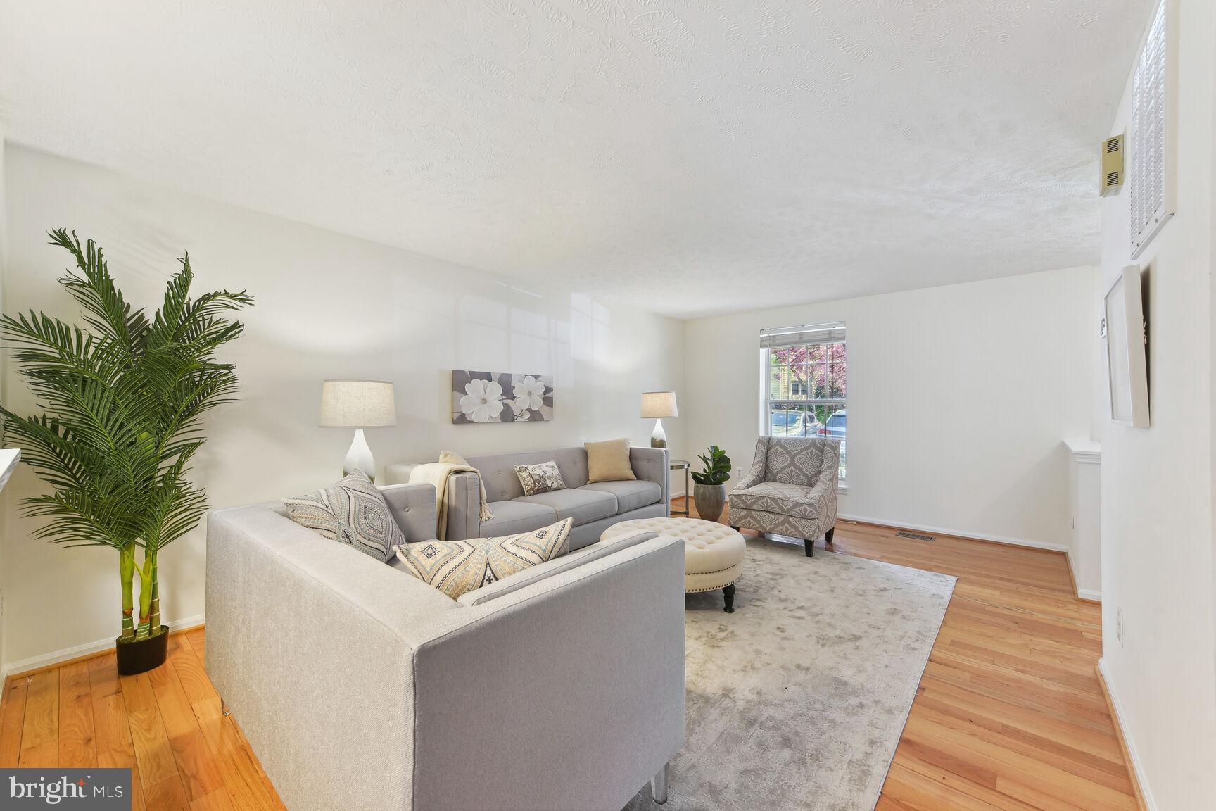 1553 Autumn Ridge Circle Reston, VA 20194 - Photo 3 of 33 New hardwood floors throughout the main level