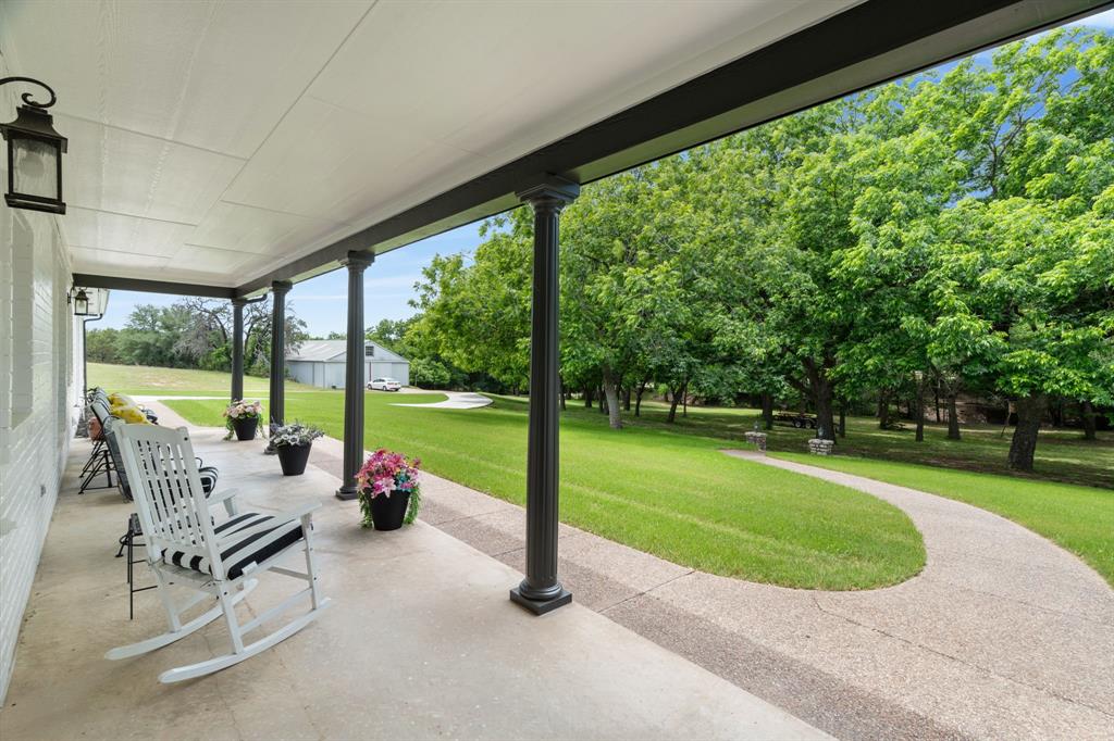 72 Crown Road Willow Park, TX 76087 - Photo 3 of 40 a building outdoor space with seating space