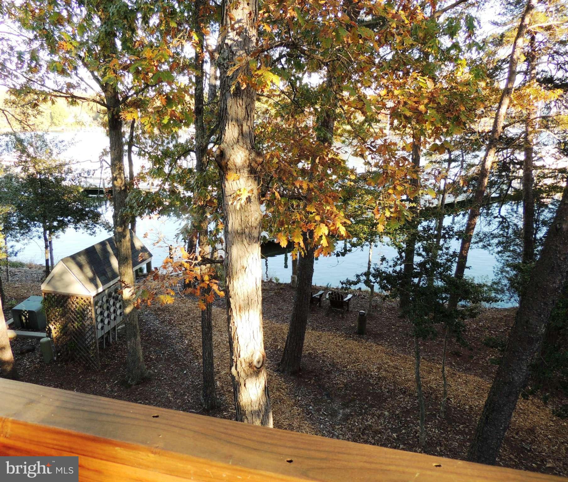 722 Runabout Loop, Unit 722 Solomons, MD 20688 - Photo 1 of 30 a backyard of a house with lots of green space